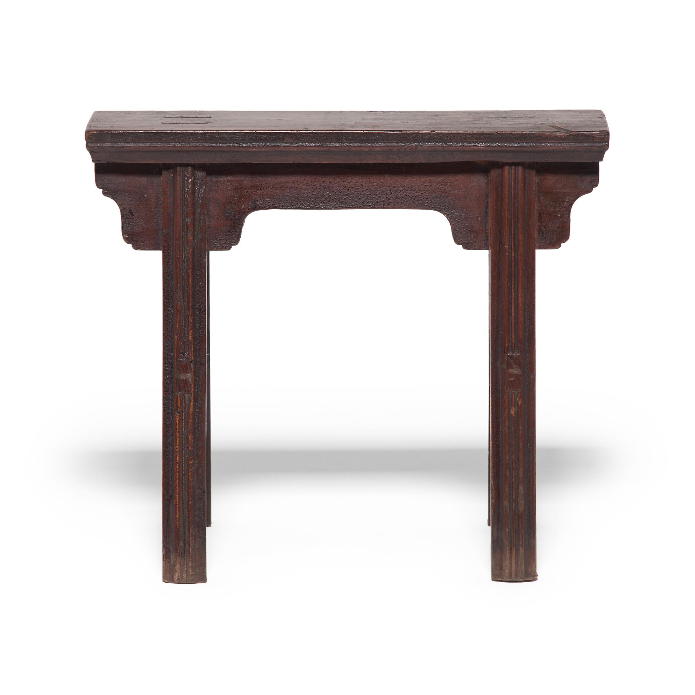 Elegantly simple in design, this pair of carriage benches from China's Zhejiang province celebrates the beauty of clean lines. Made of northern elmwood, each bench was constructed with mortise-and-tenon joinery techniques - an age-old method of
