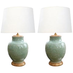 Pair of Chinese Carved Celadon Glazed Ovoid-form Lamps