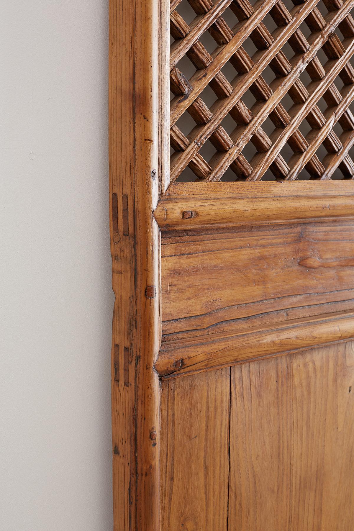 19th Century Pair of Chinese Carved Elm Lattice Door Panels
