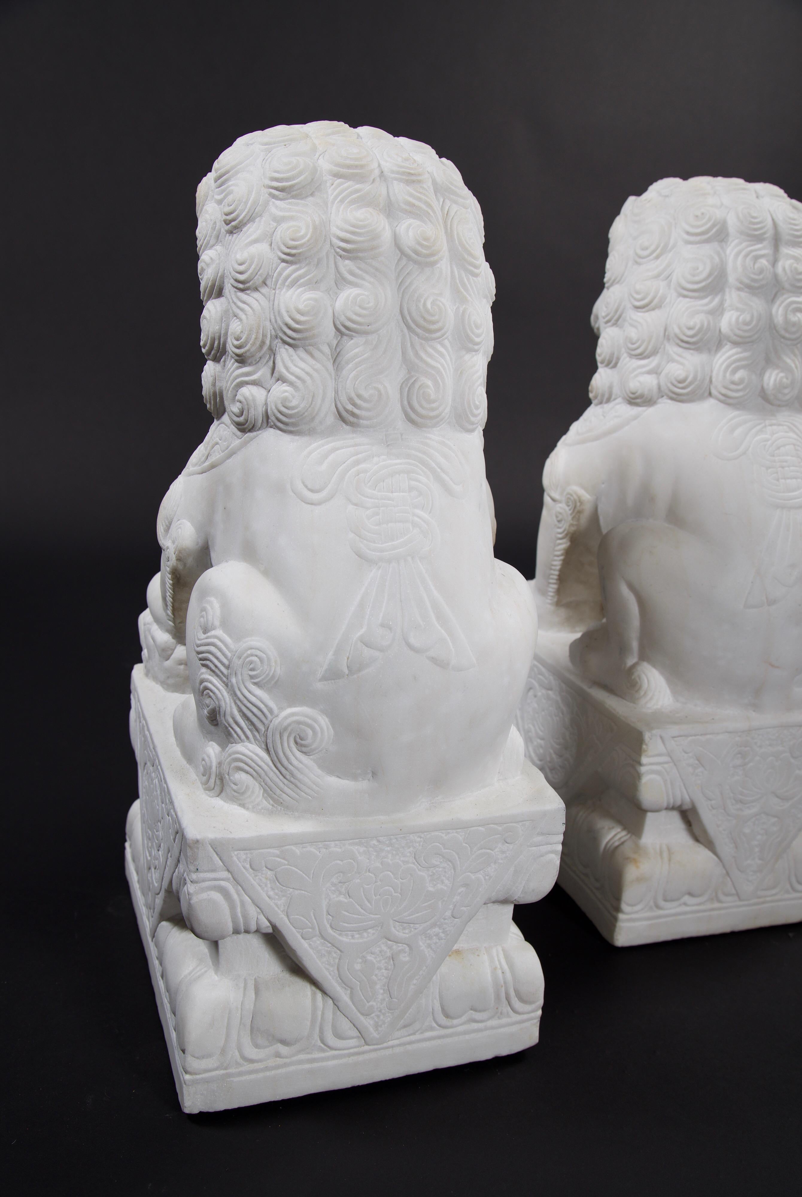 Pair of Chinese Carved Marble Foo Dogs In Excellent Condition In Los Angeles, CA