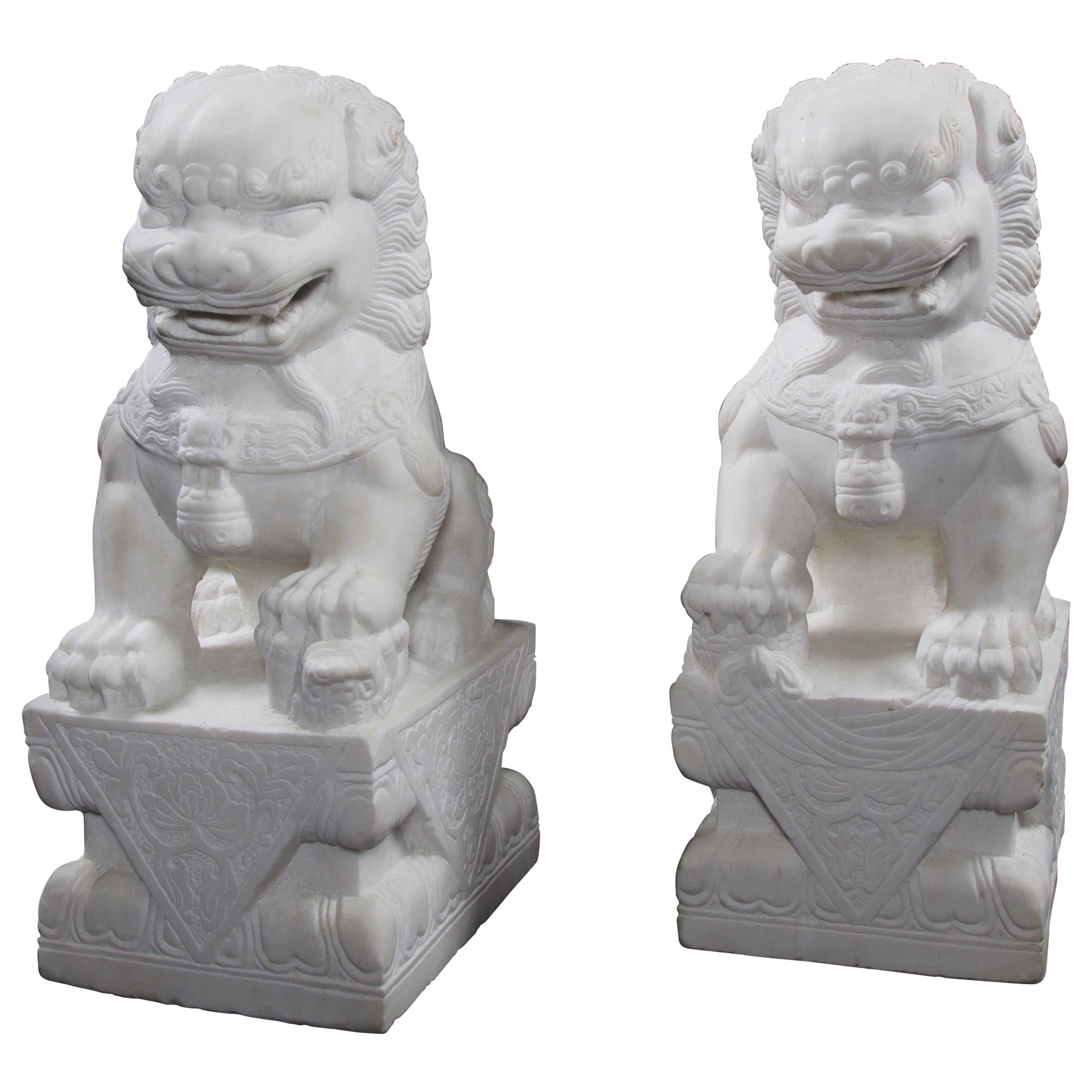 Pair of Chinese Carved Marble Foo Dogs