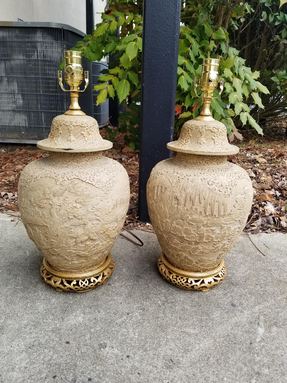 Pair of Chinese carved wood lamps with gilded bases, circa 1880-1920
Brand new wiring.