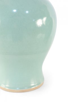 Pair of Chinese Celadon Revolving Pattern Porcelain Urns