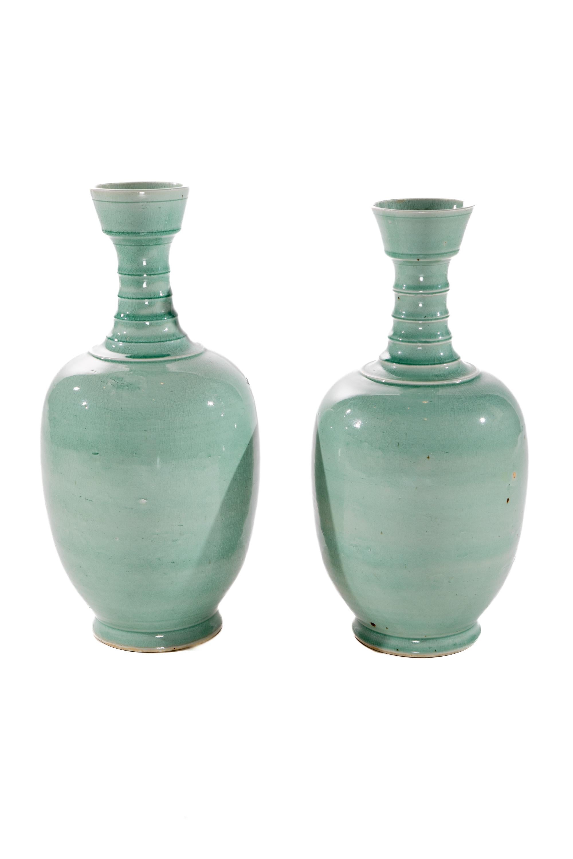 Pair of Chinese Celedon vases with ringed turned necks