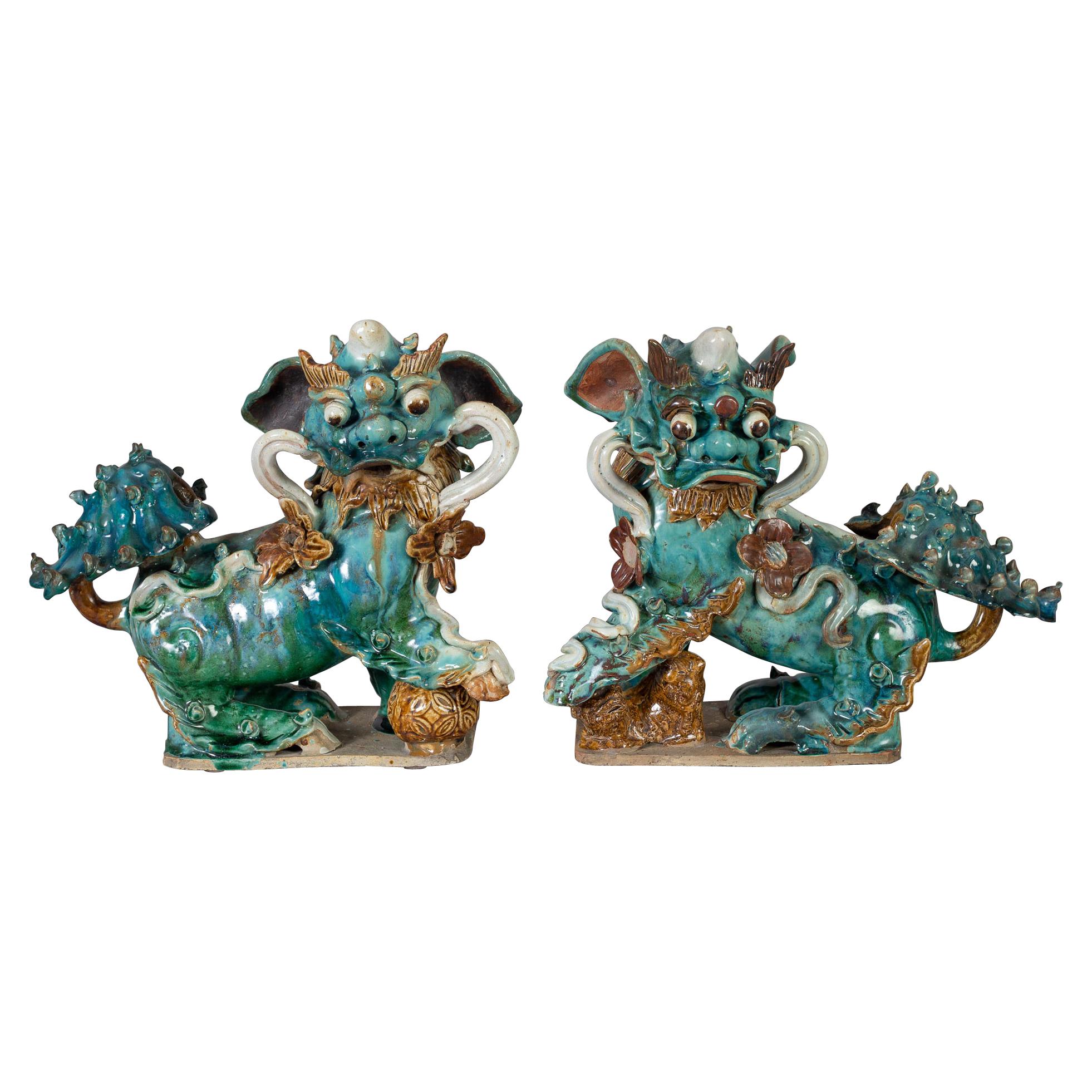 Pair of Chinese Ceramic Buddhistic Lions For Sale