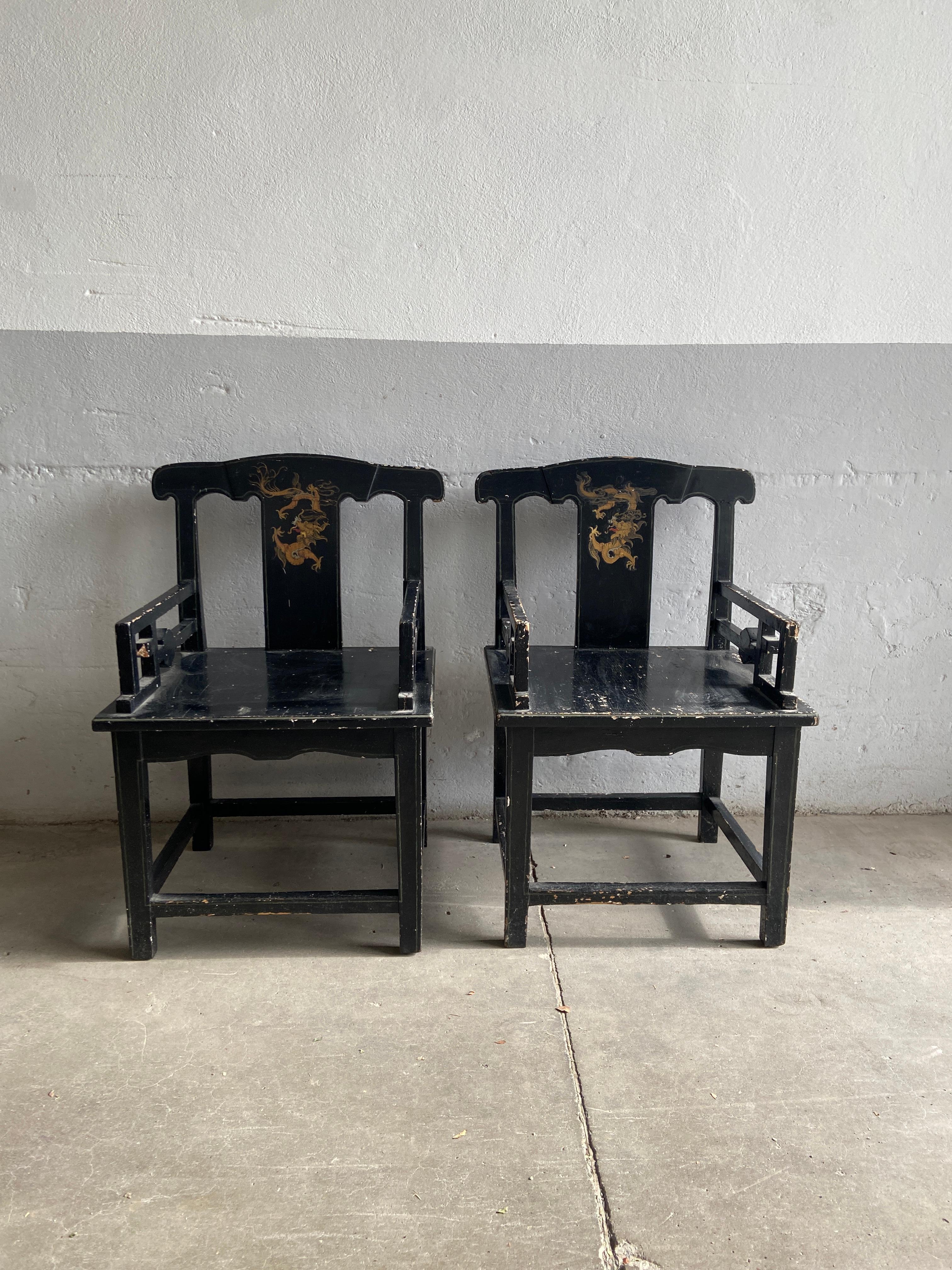 Pair of Chinese armchair in lacquered black wood with gold and red hand painted decorations.
This item has a wonderful patina due to age and use. The structure is real very solid