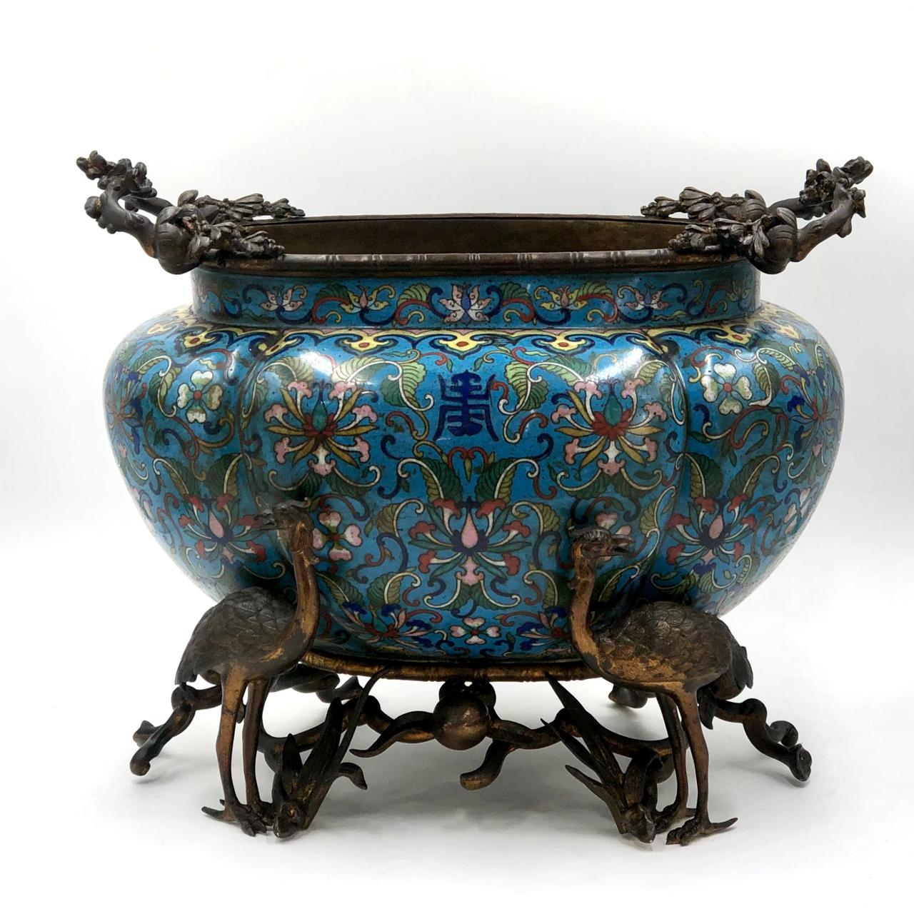 Pair of Chinese cloisonné planters
Origin: China, circa 1890
The bronze structures are possibly made in Europe.
The enamel is in excellent condition, and the bronze structures have their original patina.
Colors: yellow, red, blue, white, and