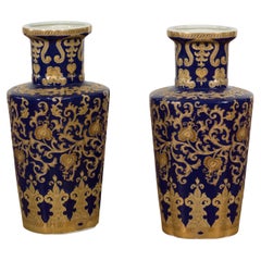 Paire de vases vintage bleu foncé et or au design complexe