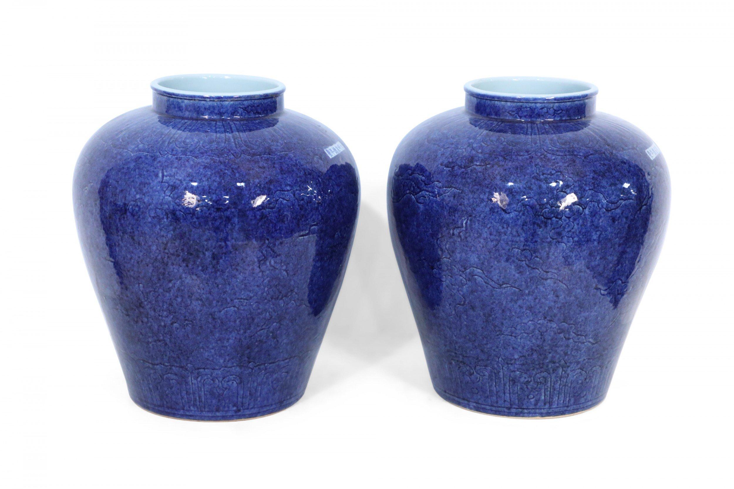 Pair of Chinese Cobalt Blue and Incised Dragon Motif Vases 1