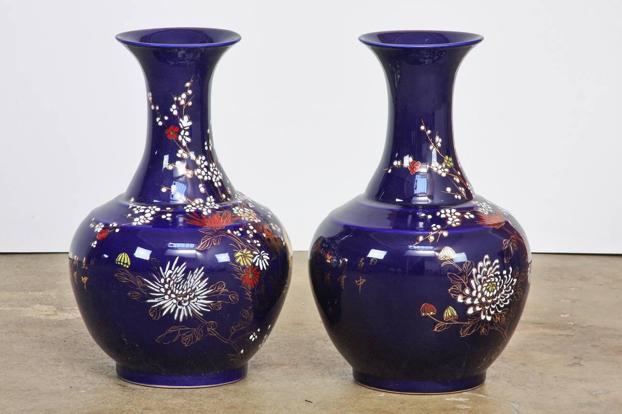 Hand-Painted Pair of Chinese Cobalt Blue Flora and Fauna Trumpet Vases