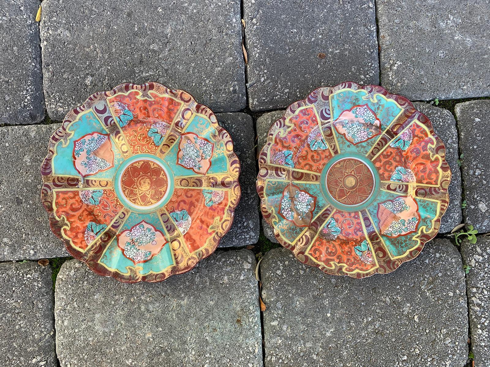 Pair of 19th-20th century Chinese colorful porcelain plates with scalloped edge and gilt details. Old painted label.