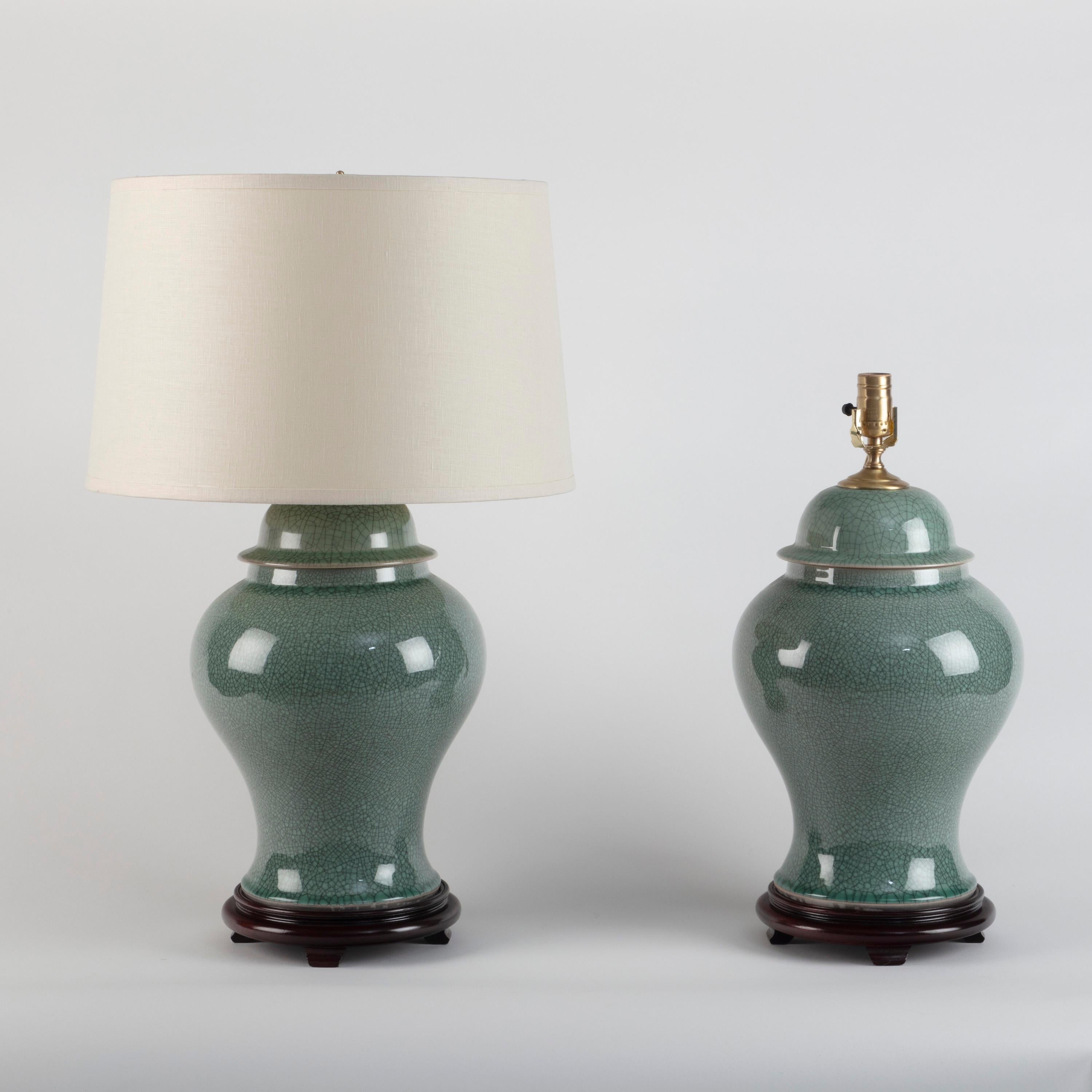 Pair of Chinese crackle celadon temple jar table lamps.
