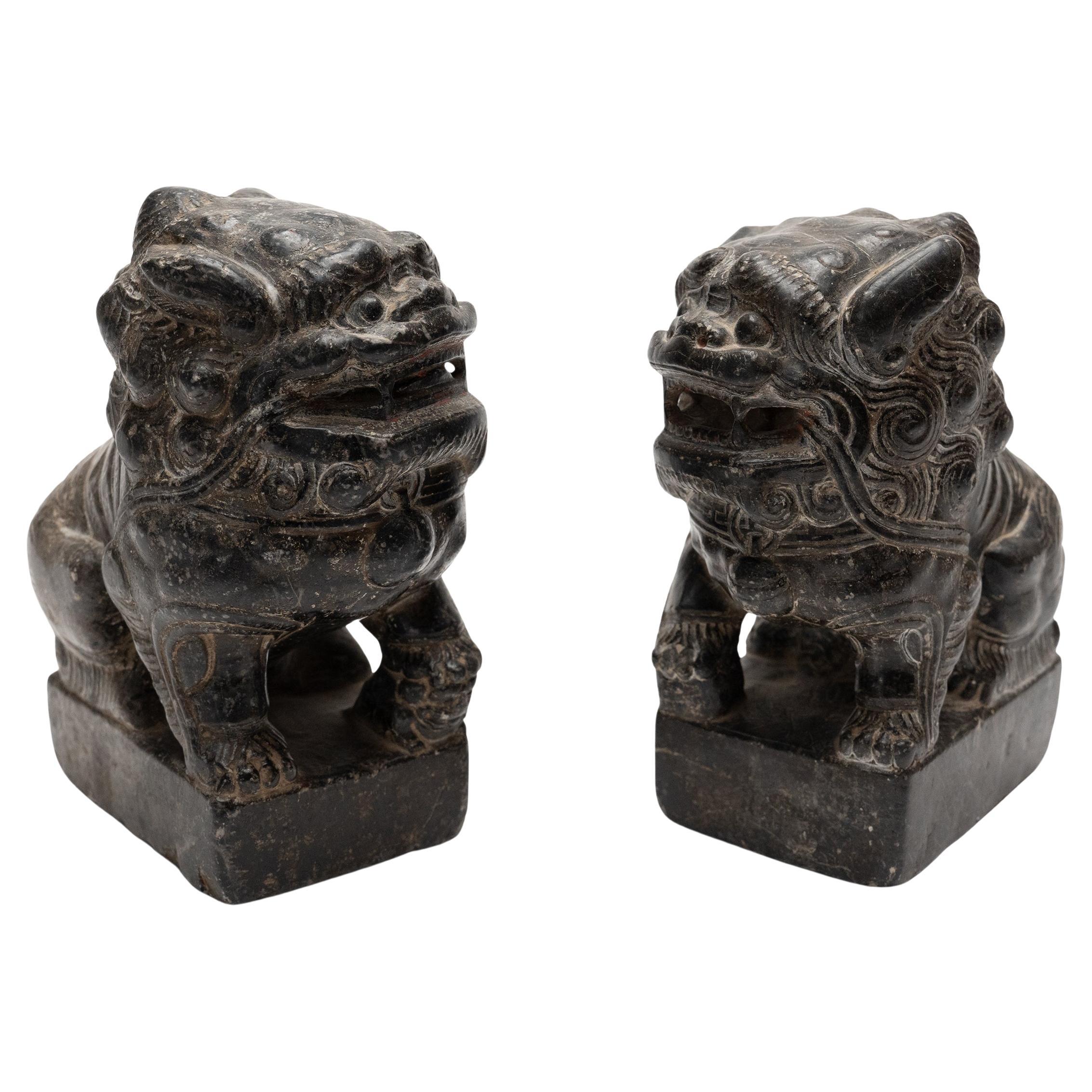 Pair of Chinese Dark Stone Fu Lions, c. 1800