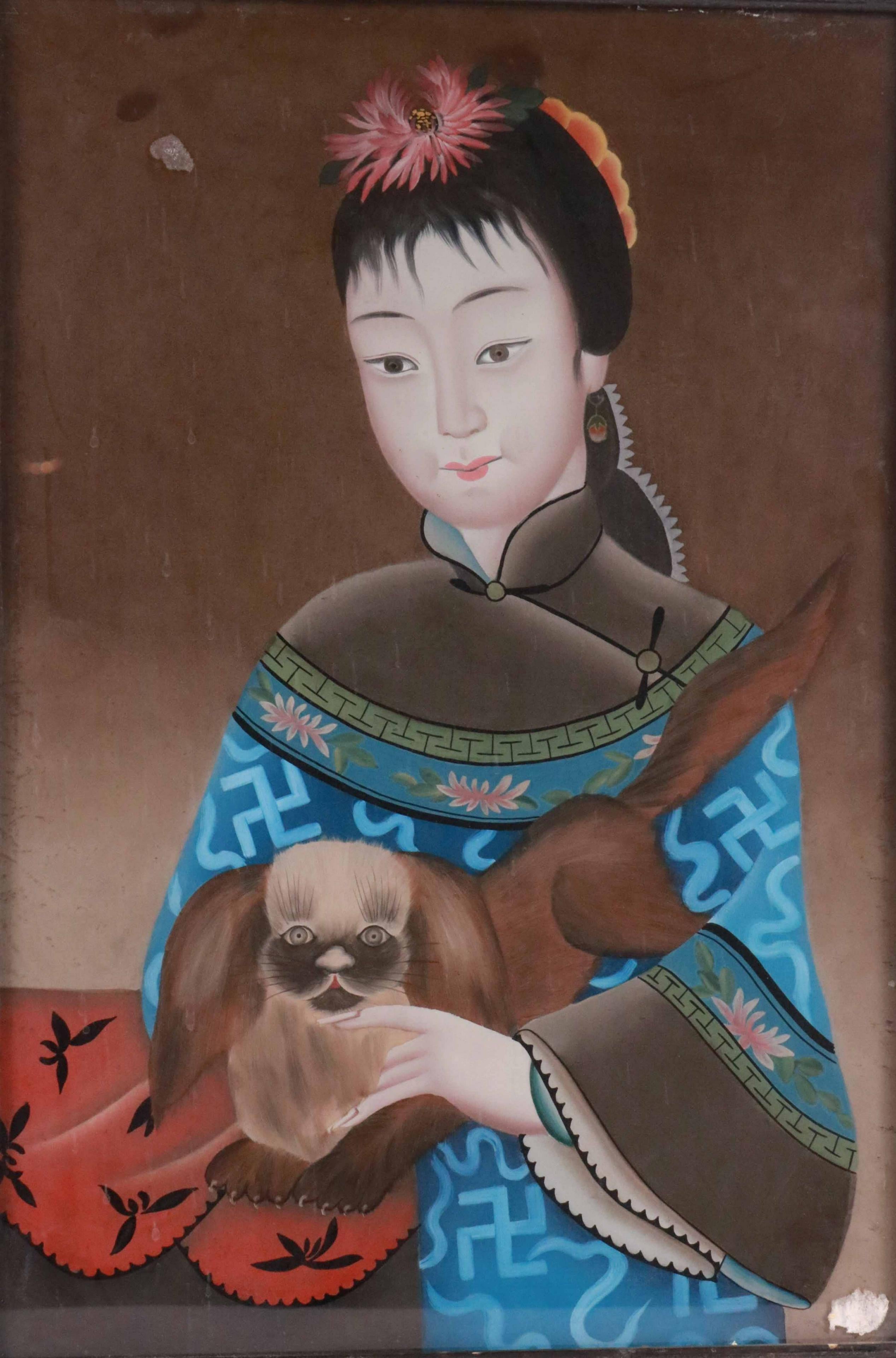 A pair of early 19th century Chinese export églomisé (reverse paintings on glass) portraits of two beauties, one holding a flower blossom, and the other a small lap dog.