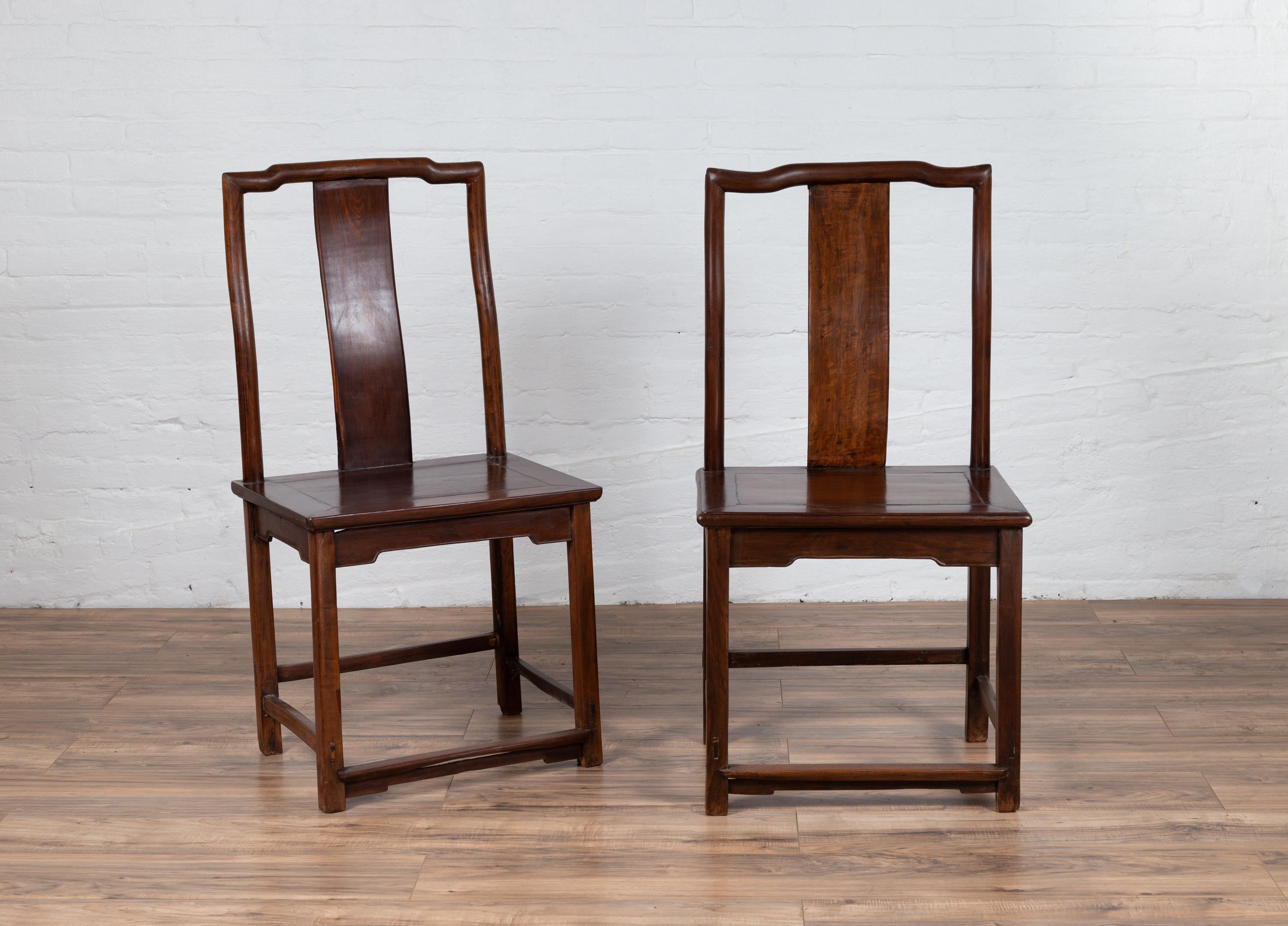 20th Century Pair of Chinese Elm Dark Patina Scholar's Ceremonial Chairs with Sinuous Splats For Sale