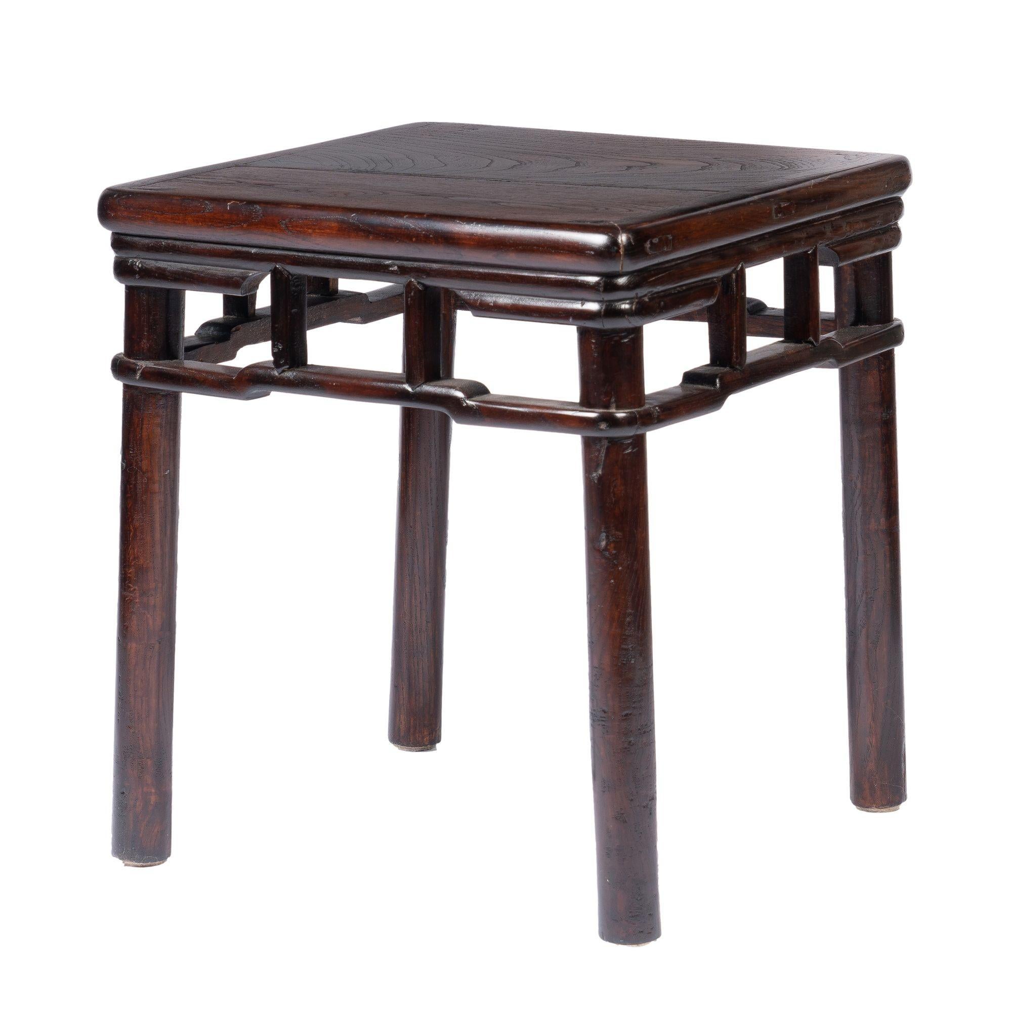 Qing Pair of Chinese Elm Stools with Hump Back Rail, 1780-1820 For Sale