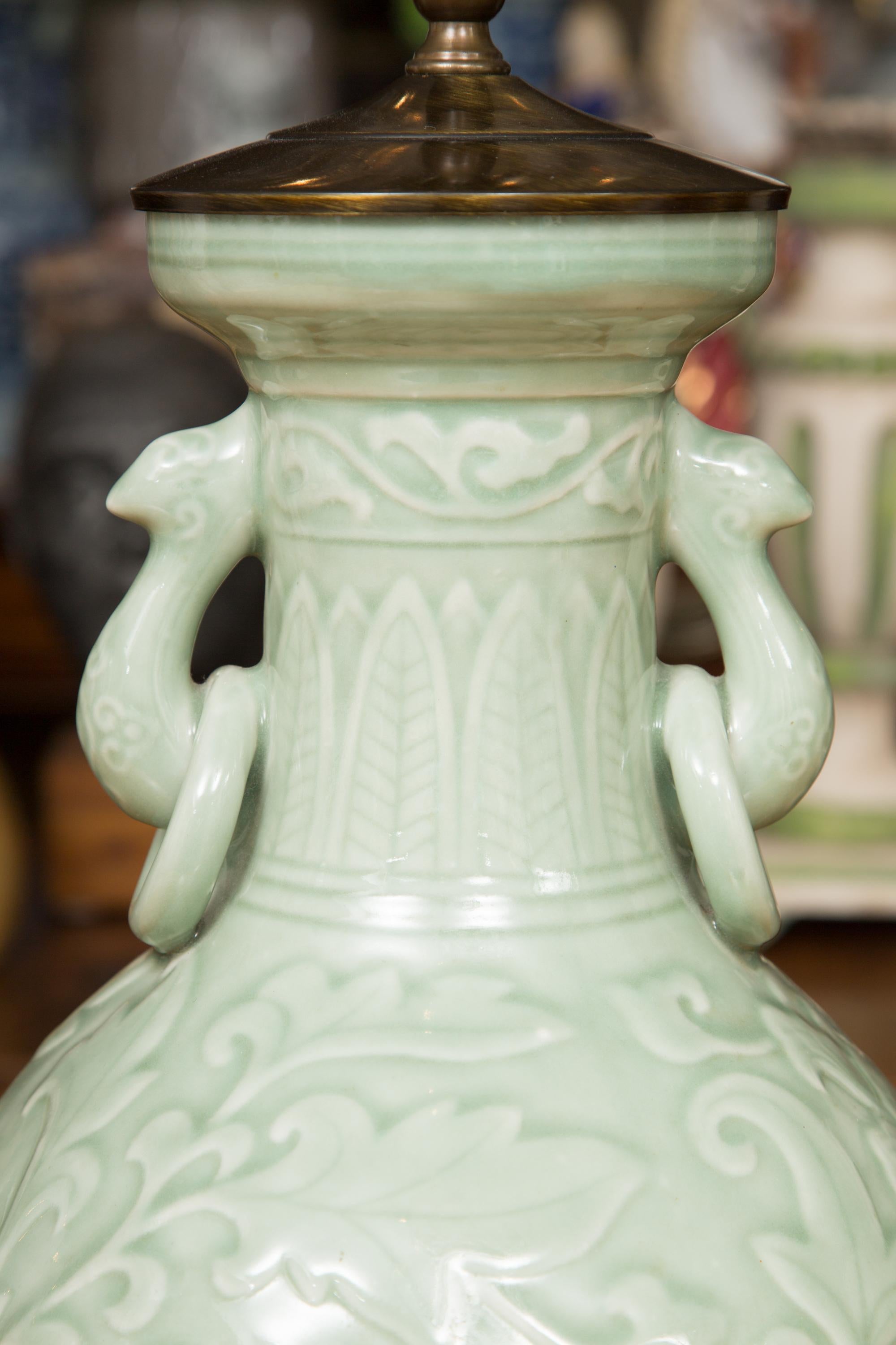 Pair of Chinese Embossed Celadon Lamps In Good Condition In WEST PALM BEACH, FL