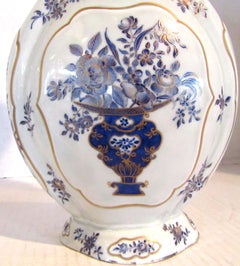 Pair of Chinese Export Blue and White Garniture Vases with Lids