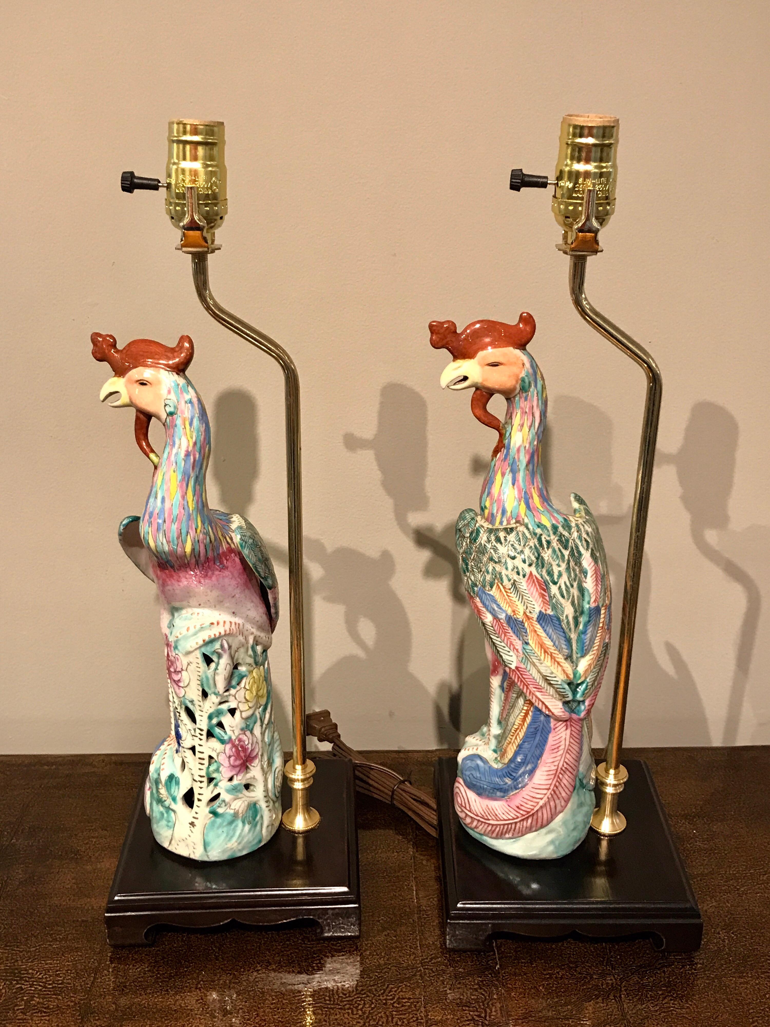 Pair of Chinese export famille verte birds of paradise figures, now as lamps, each one custom mounted on square hardwood stands with brass lamp fittings. The height of the birds is 16