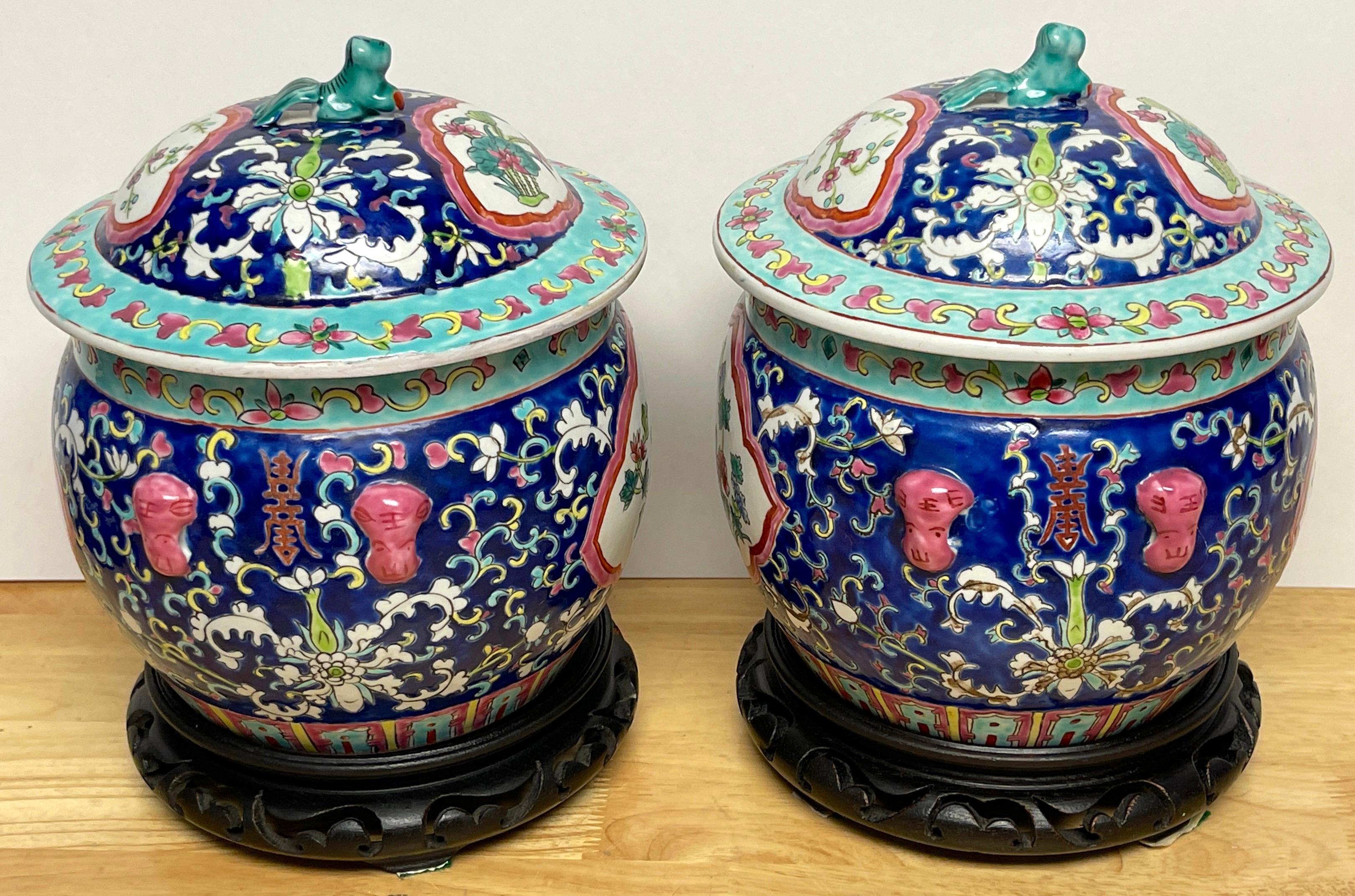 Porcelain Pair of Chinese Export Famille-Rose Enameled Covered Urns & Stands  For Sale