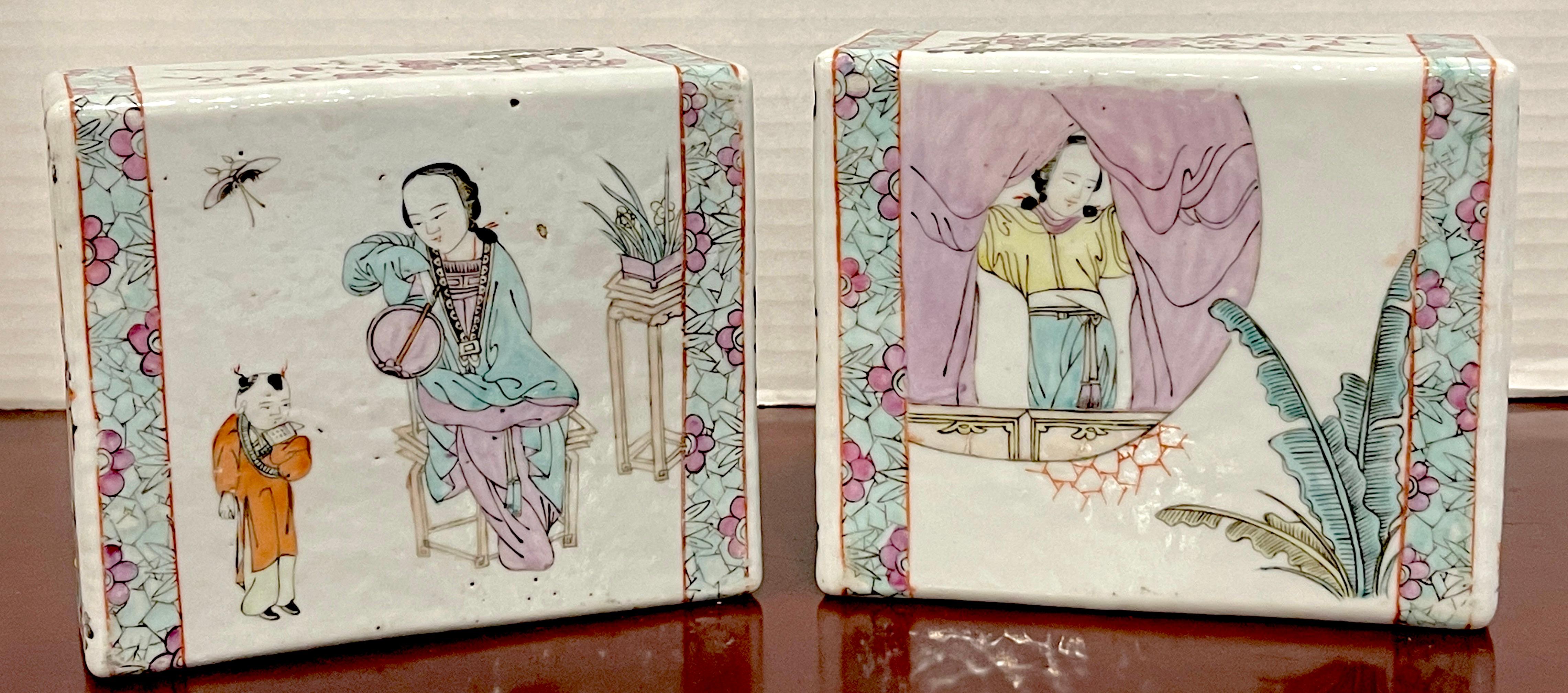 Pair of Chinese Export Famille Verte pillows, Rare to find a pair, each one decorated with figures in landscape, opposing, presents beautifully as a pair. With pierced floral trellis ends and cherry blossom sides.
  