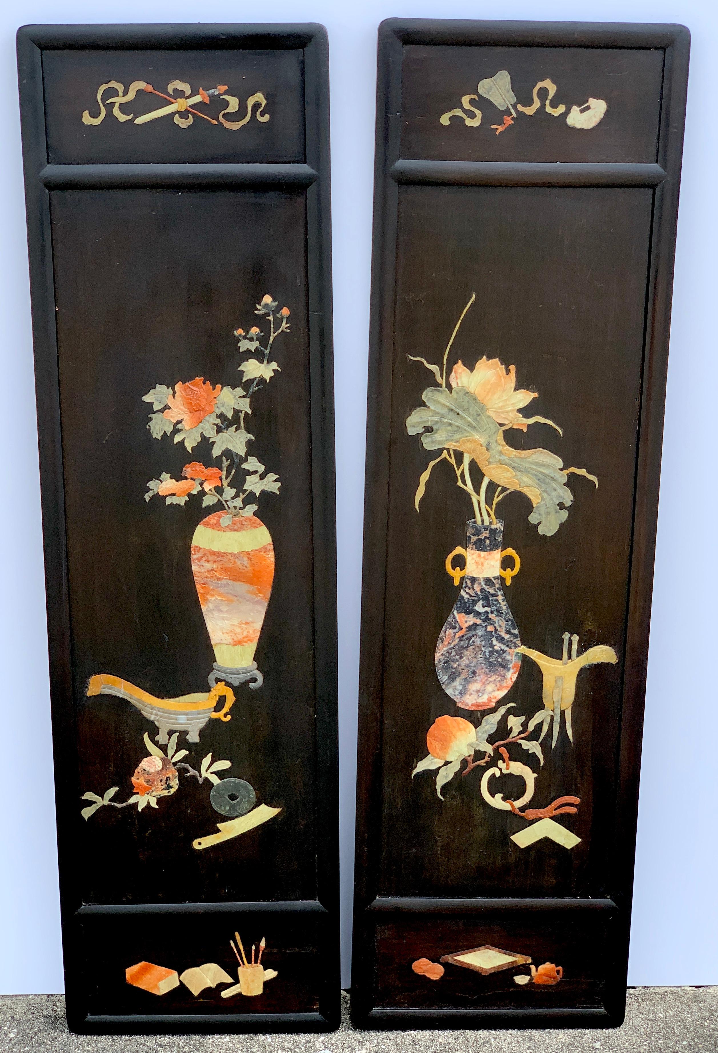 Pair of Chinese export inlaid hardstone still life panels, each one of rectangular form, with various semi-precious stones inlaid of vases and scholars objects.