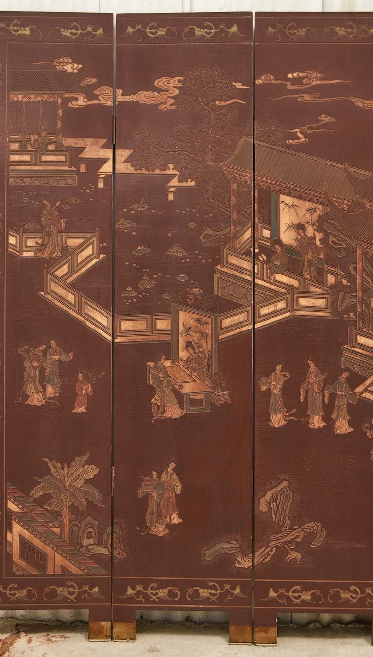 Pair of Chinese Export Lacquer Faded Coromandel Screens 1