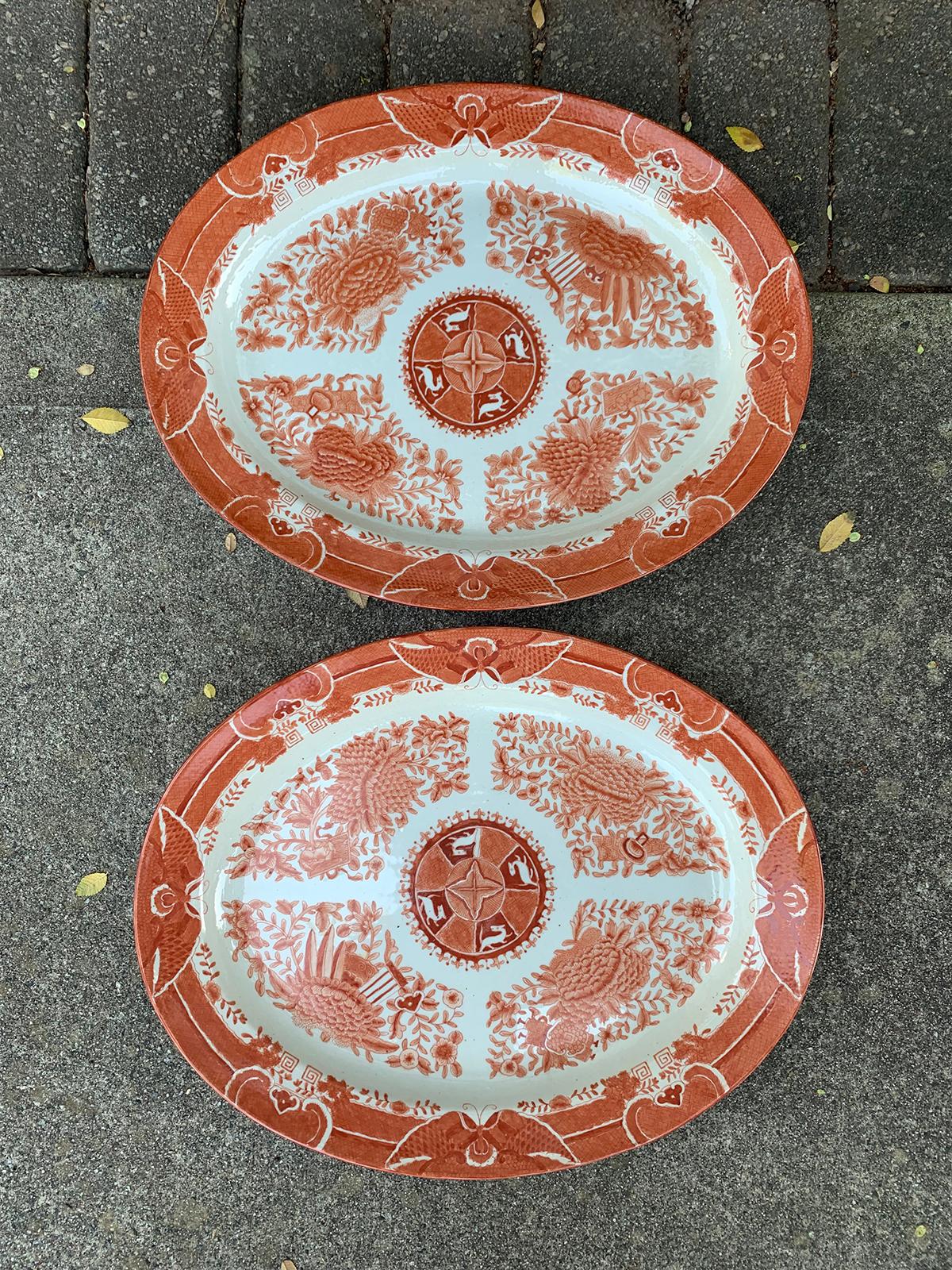 Pair of Chinese export oval orange and white porcelain platters in rare Fitzhugh pattern, circa 1790-1800.