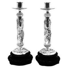 Pareja de candeleros chinos de plata de exportación