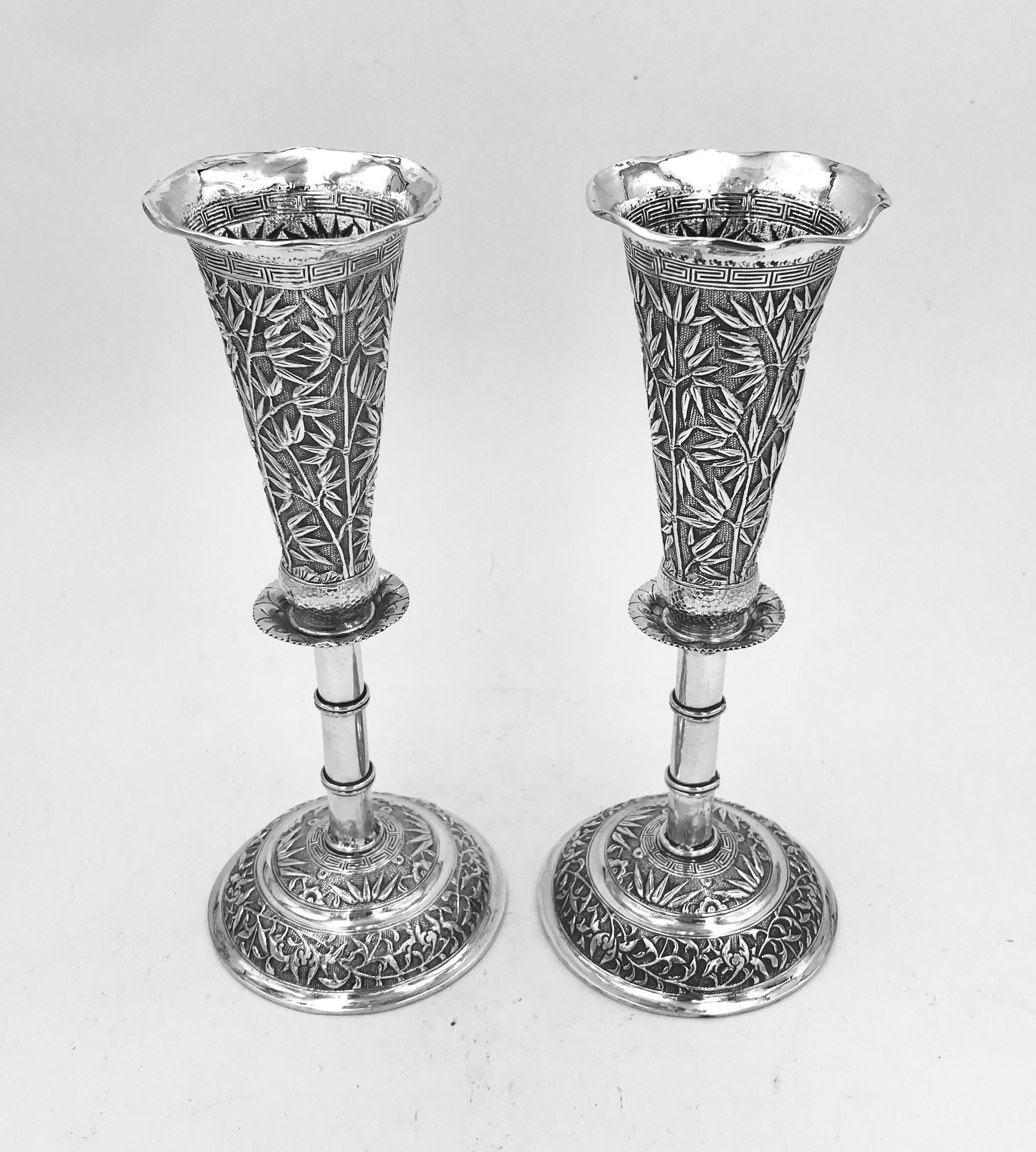 Pair of Chinese silver vases with all-over bamboo decoration and each with a wavy-edge flared rim. They were made by 涂茂兴, TuMaoXing, a retailer in JiuJiang (九江), next to the Yangtze River, in Jiangxi Province, and date from circa 1895.