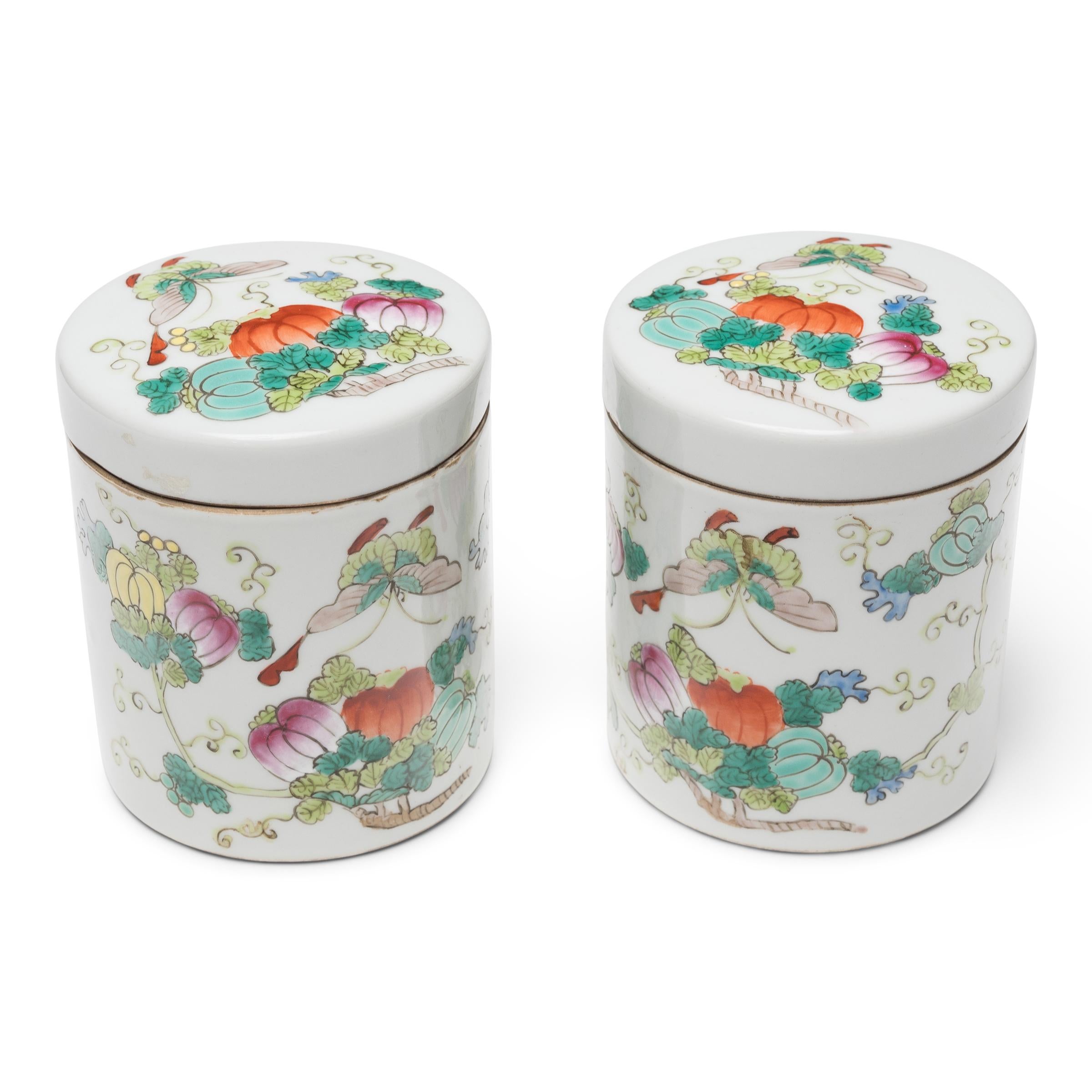 Used to store loose leaf tea, these small porcelain jars are decorated in a style of overglaze enameling known as 