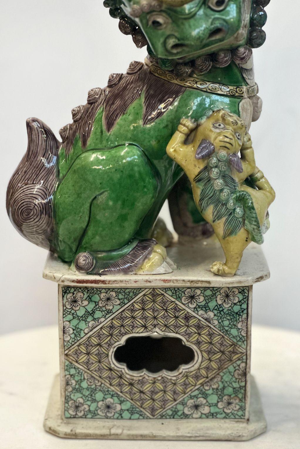 Porcelain Pair of Chinese Famille Verte Buddhist Lions from the Kangxi Period