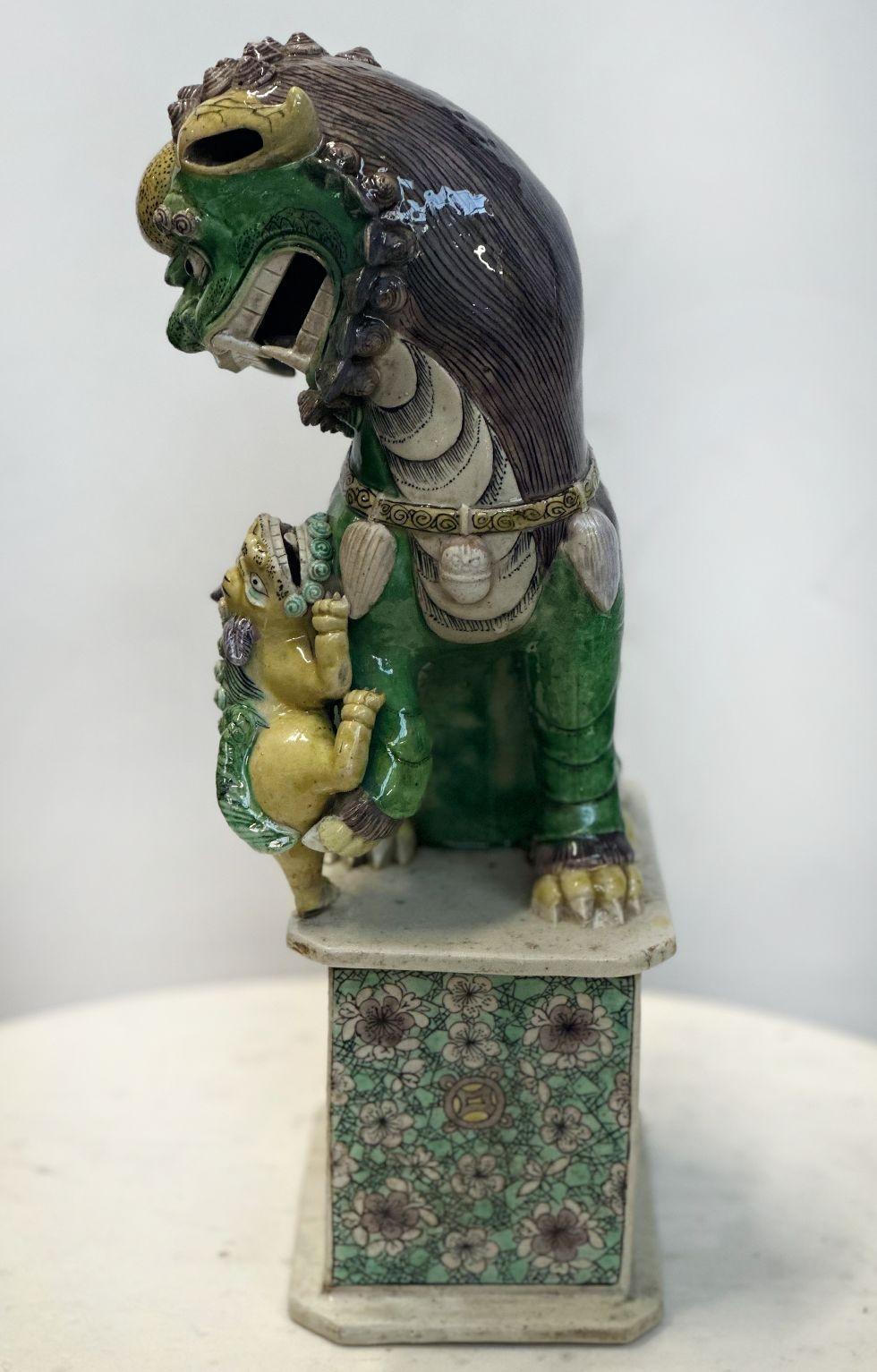 Pair of Chinese Famille Verte Buddhist Lions from the Kangxi Period 1