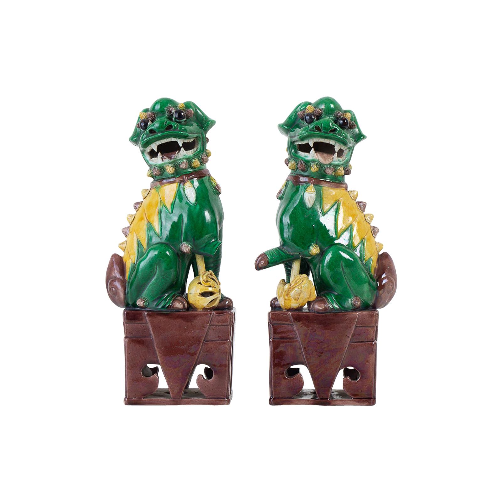 Pair of Chinese Famille Verte Foo Dogs on Stands For Sale