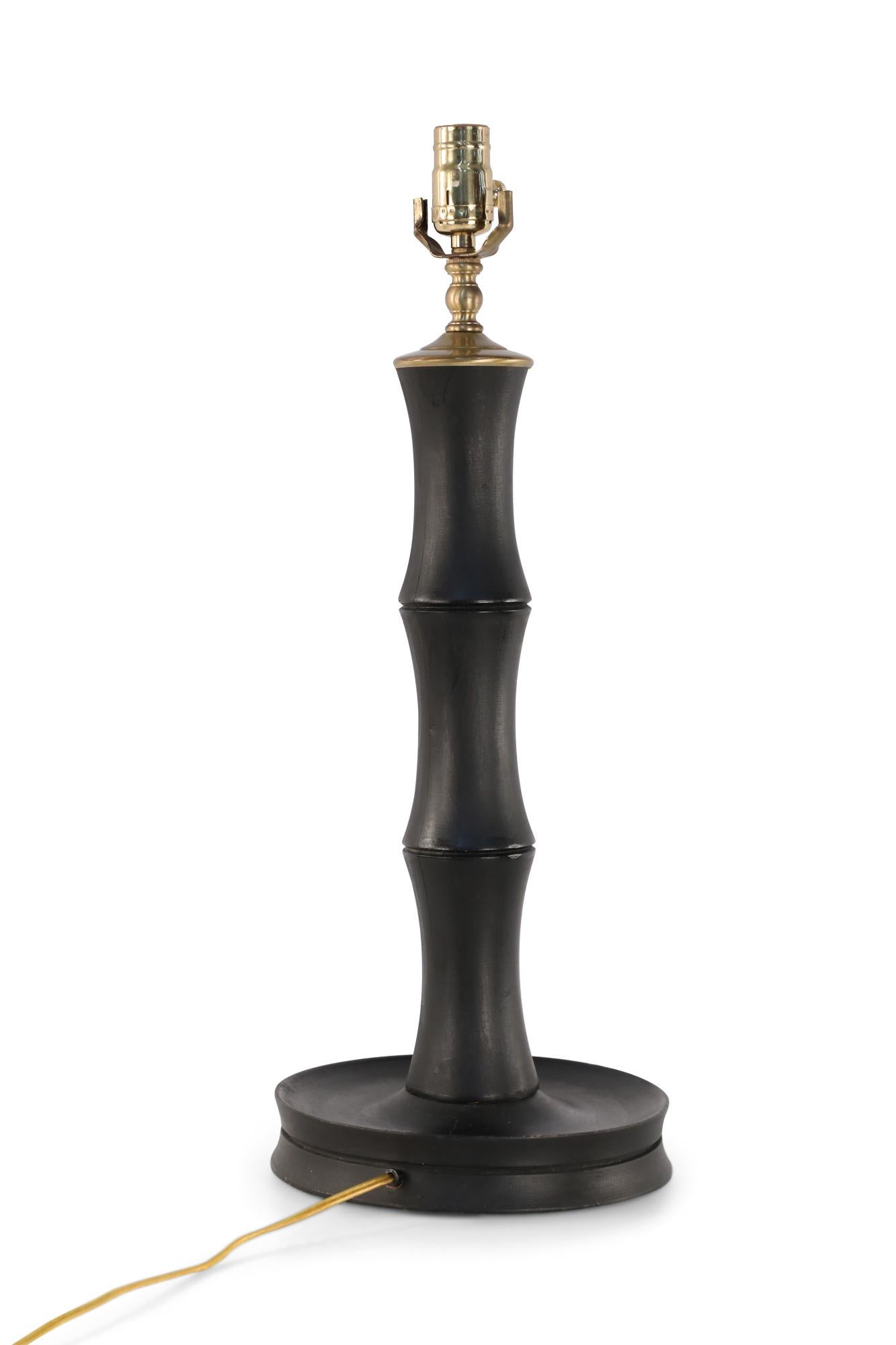 Pair of Chinese faux bamboo table lamps made from black painted wood and brass hardware.