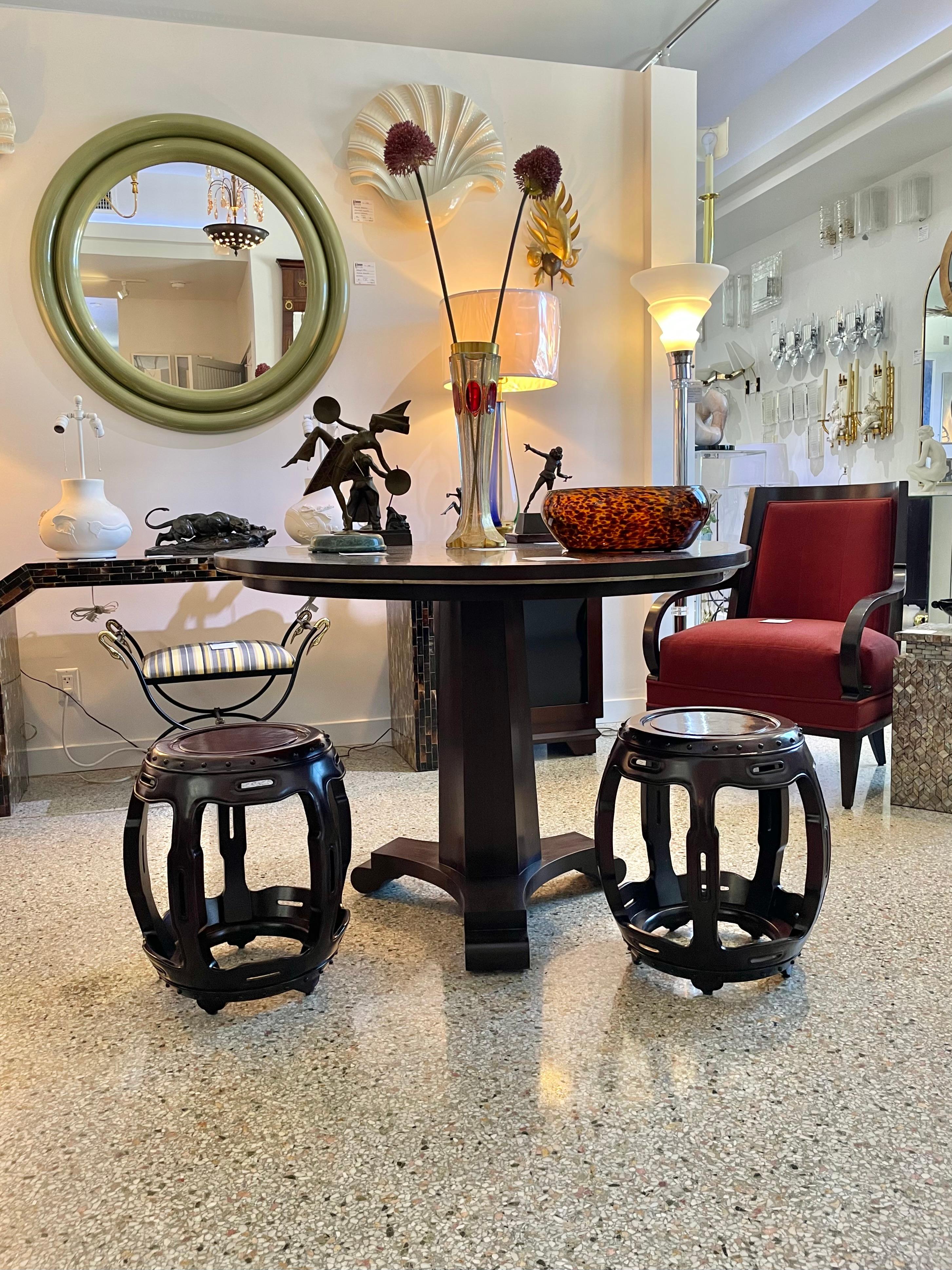 This stylish and chic pair of Chinese rosewood and burlwood tables (garden seats) will make a defenite statement with their form and use of materials. 
