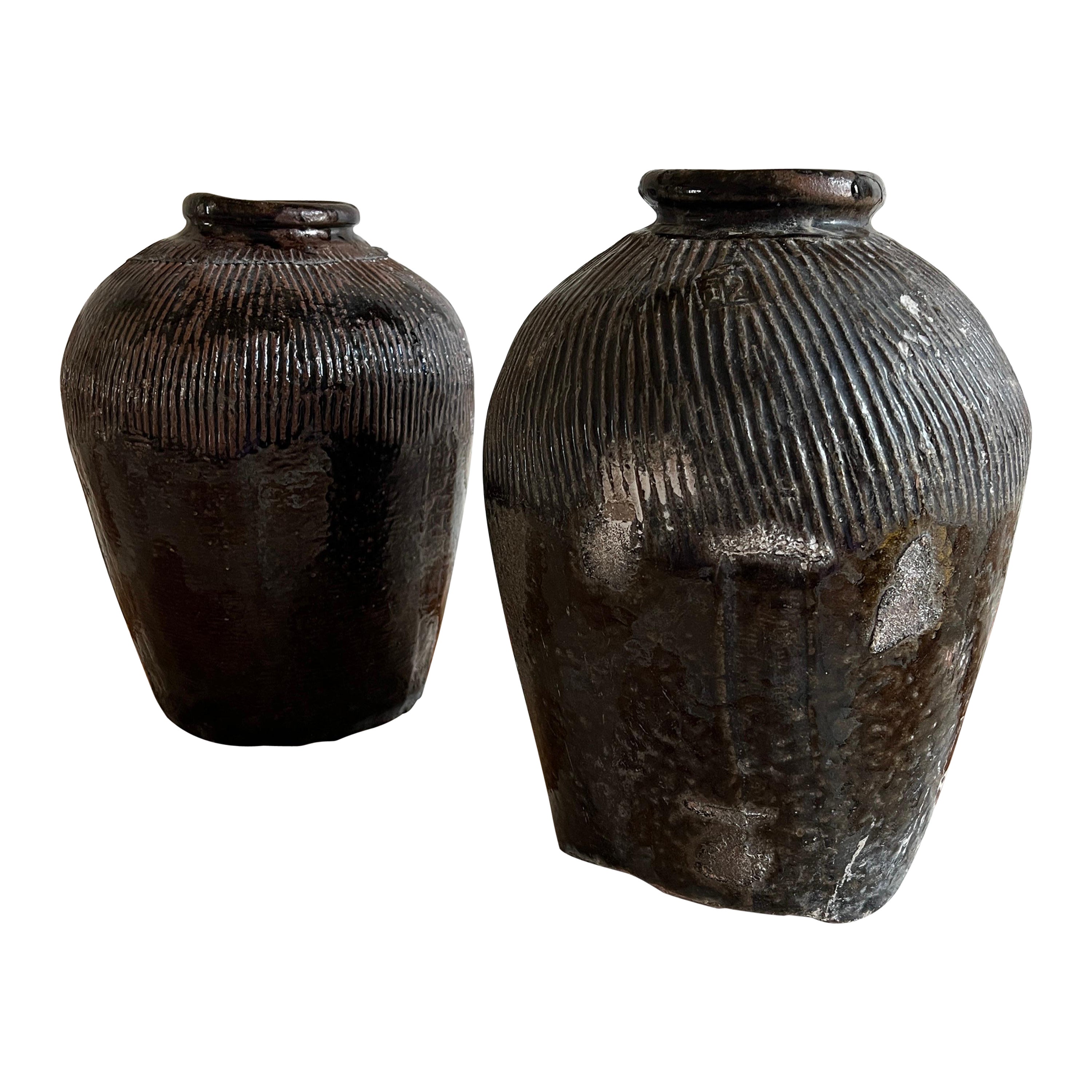 Pair of Chinese glazed 17th-century ceramic rice wine storage pots