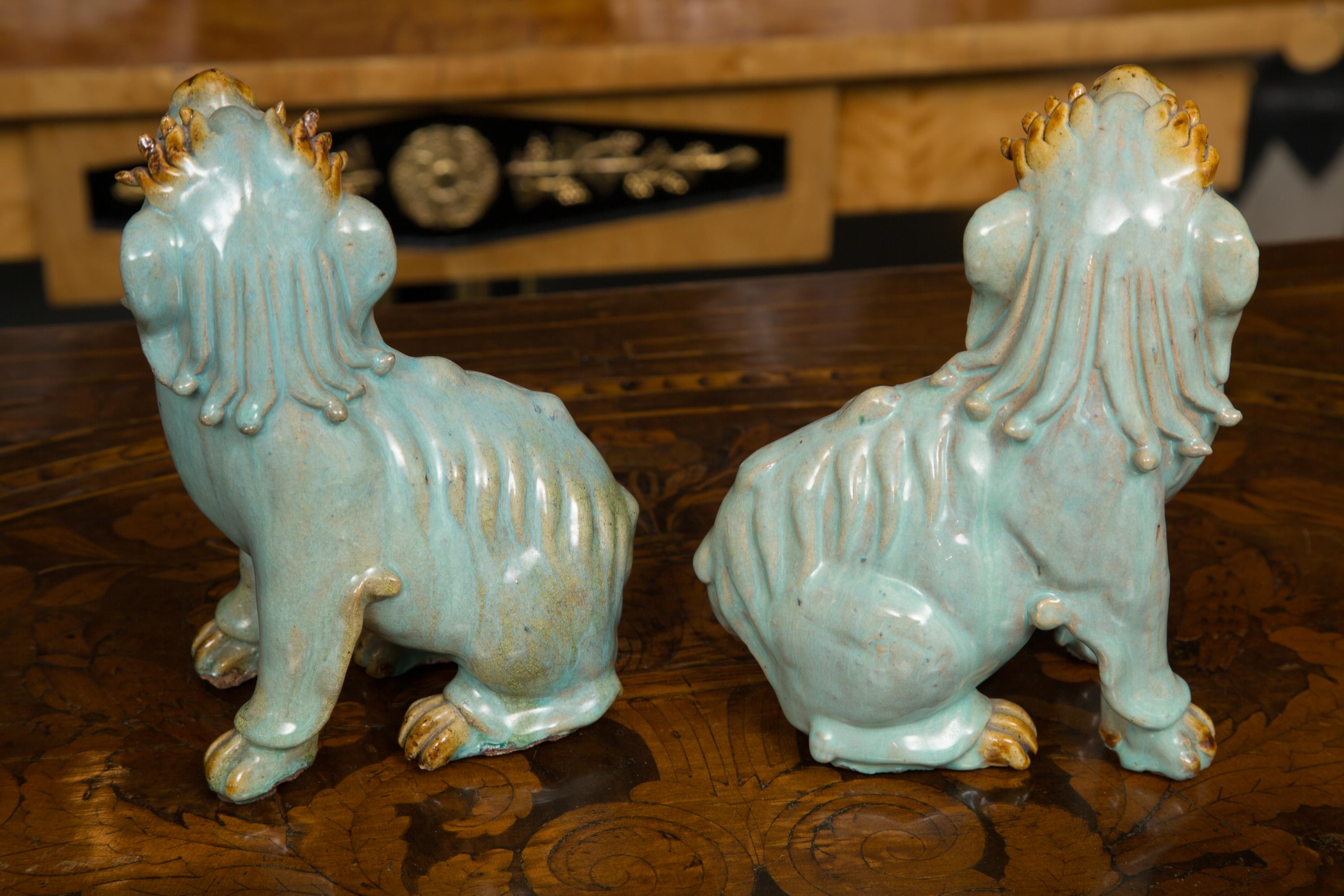 Other Pair of Chinese Glazed Bearded Dogs with Glass Inset Eyes