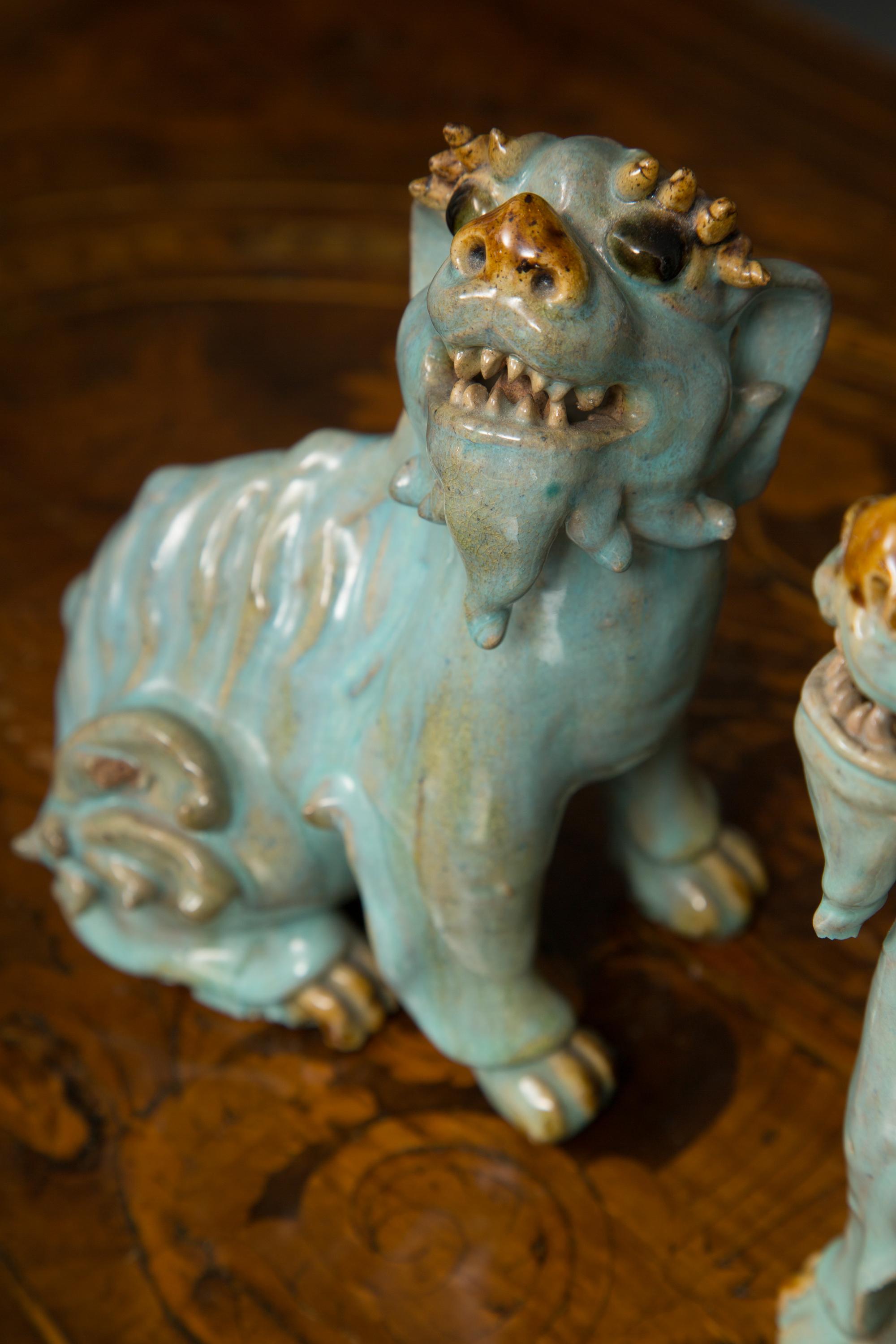 Pair of Chinese Glazed Bearded Dogs with Glass Inset Eyes 1