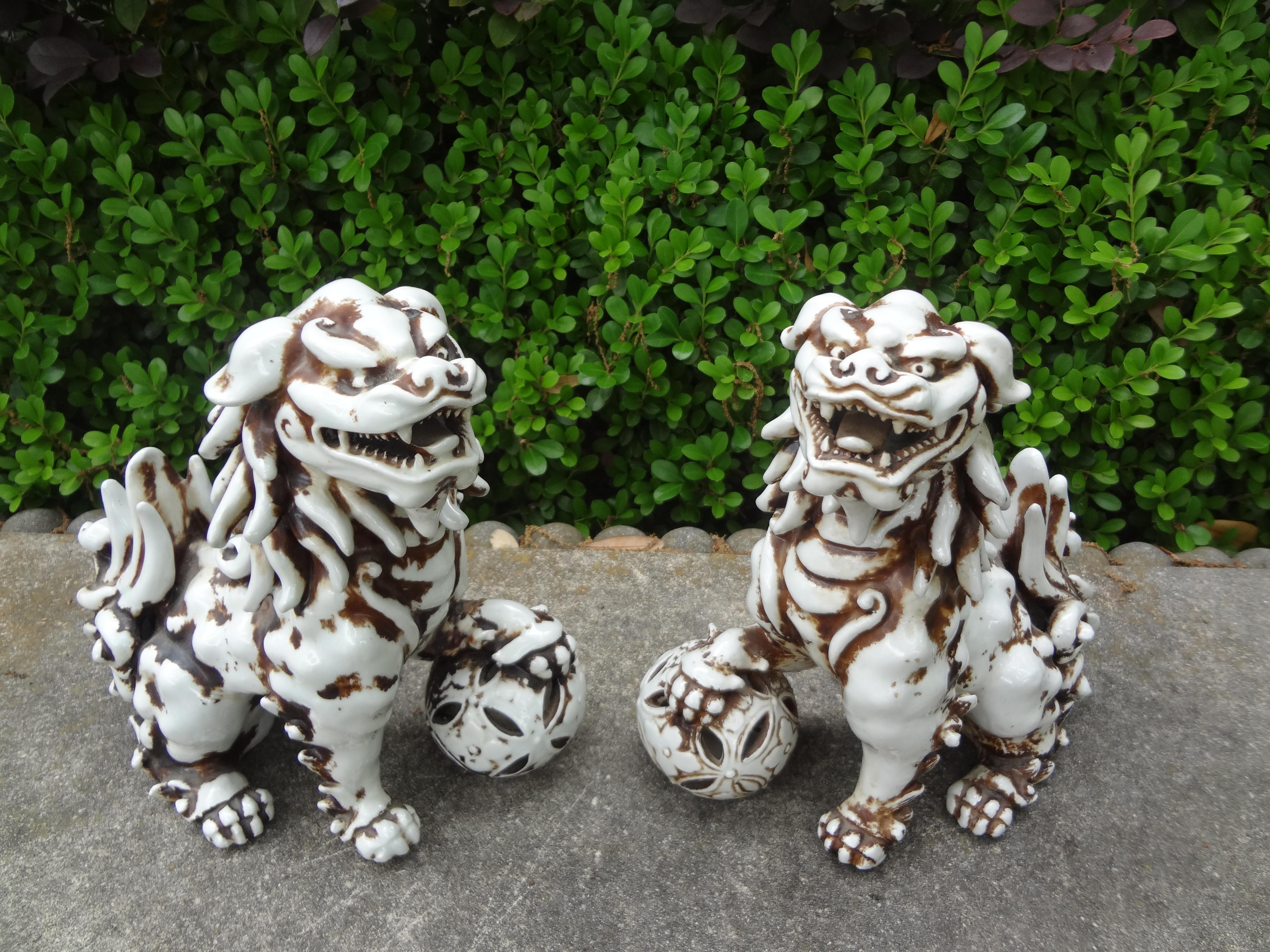 Chinese Export Pair Of Chinese Glazed Ceramic Foo Dogs For Sale