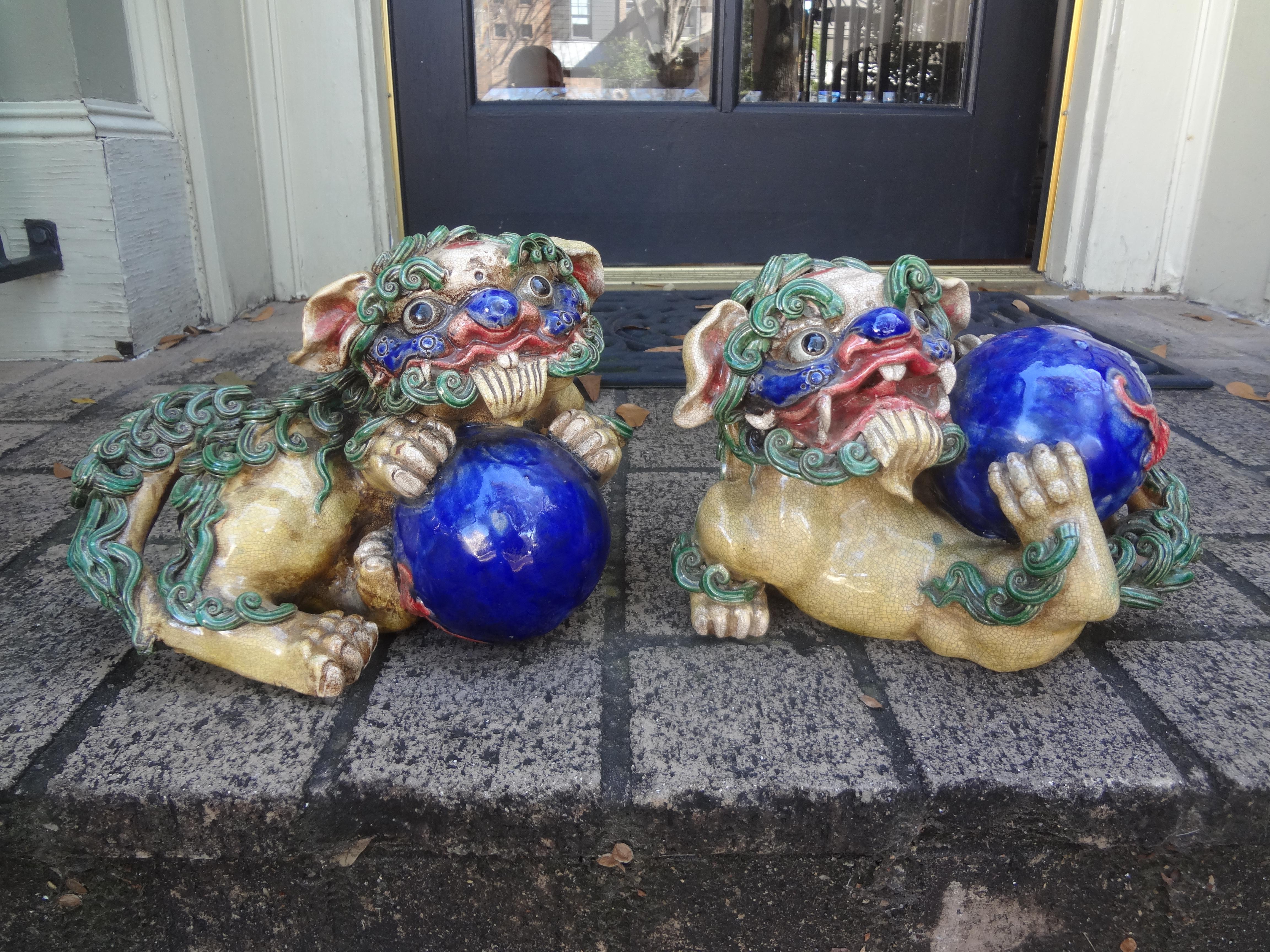 Chinese Export Pair Of Chinese Glazed Terracotta Foo Dogs For Sale