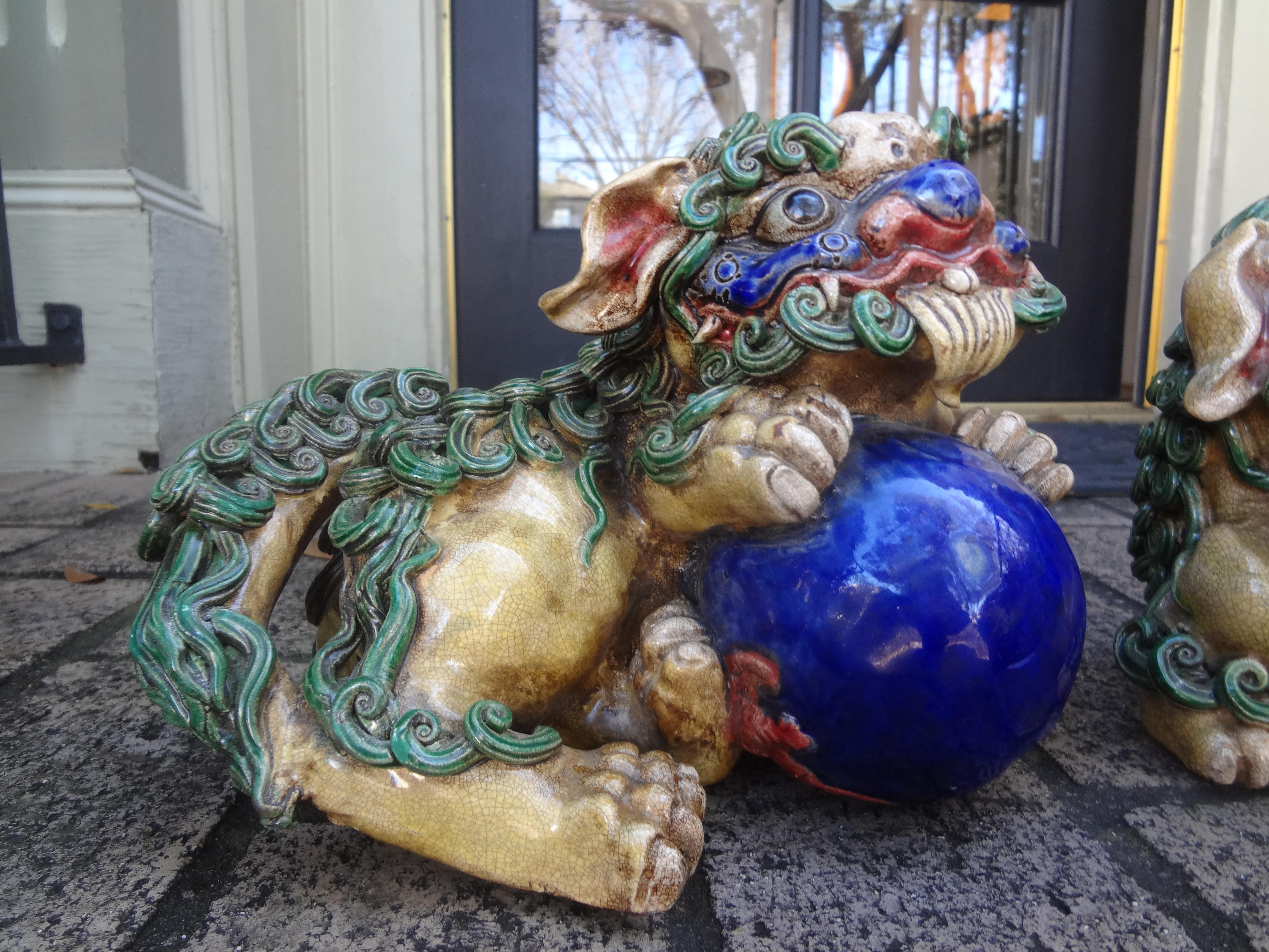Pair Of Chinese Glazed Terracotta Foo Dogs In Good Condition For Sale In Houston, TX
