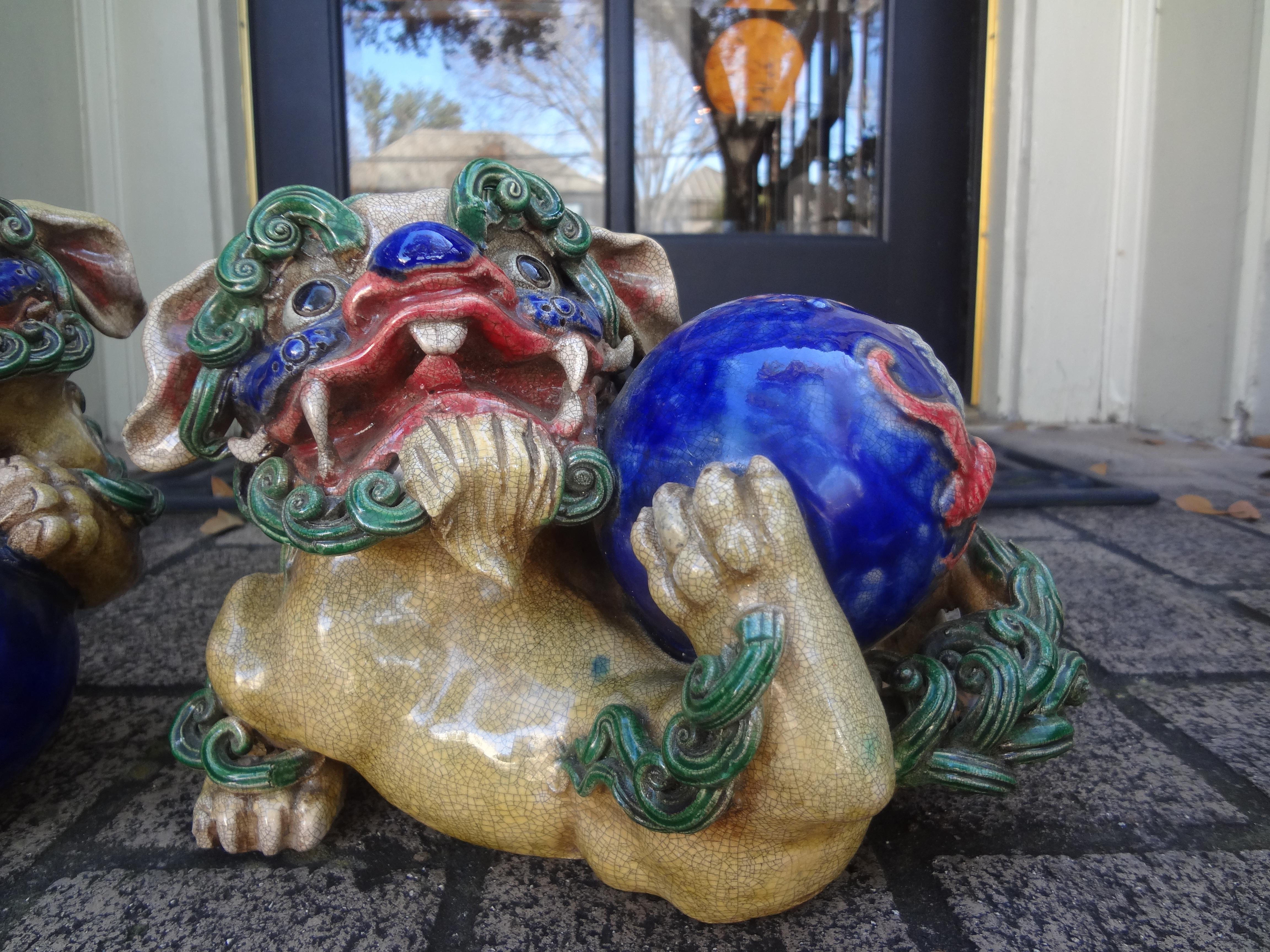 Mid-20th Century Pair Of Chinese Glazed Terracotta Foo Dogs For Sale