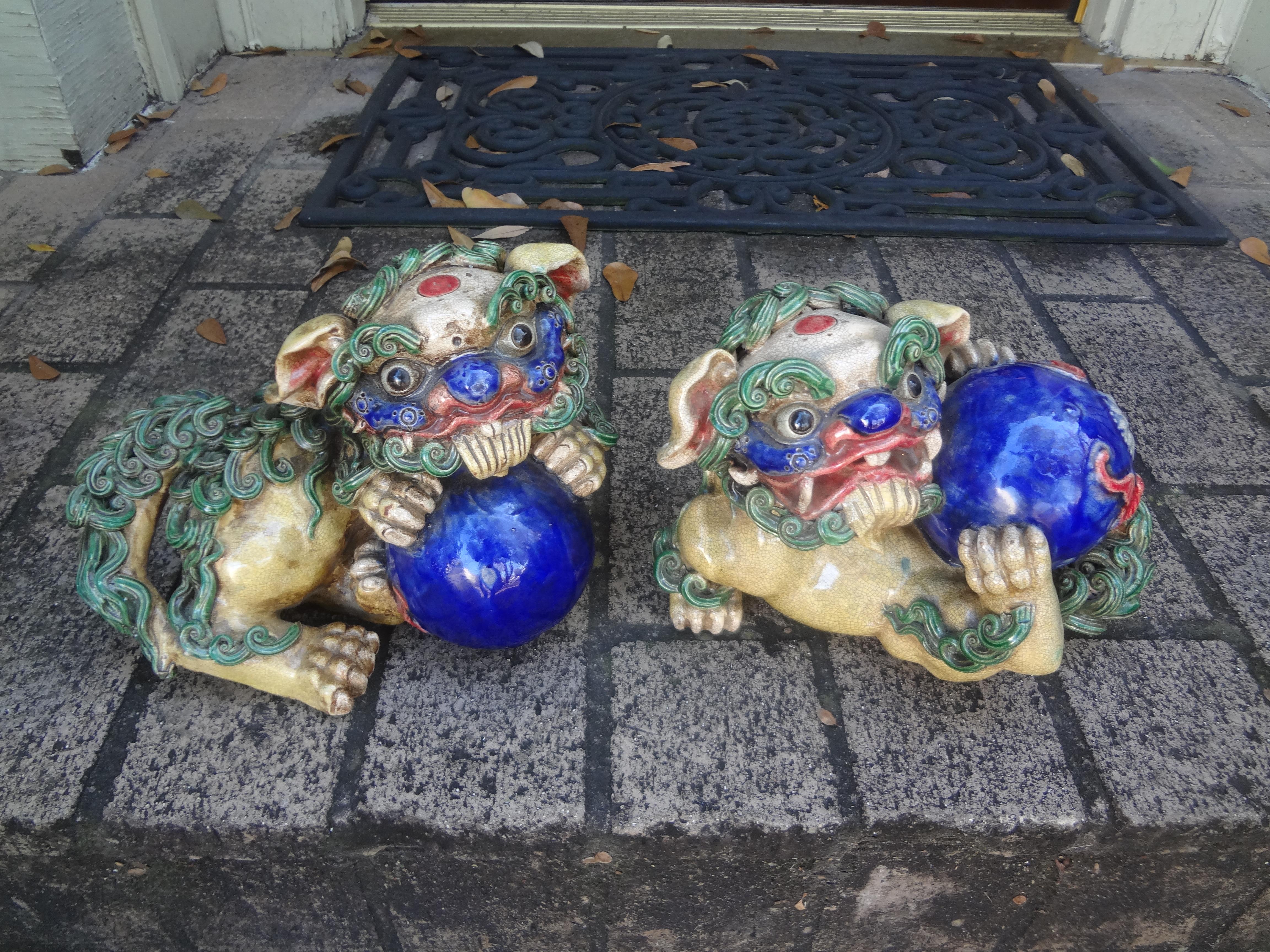 Porcelain Pair Of Chinese Glazed Terracotta Foo Dogs For Sale