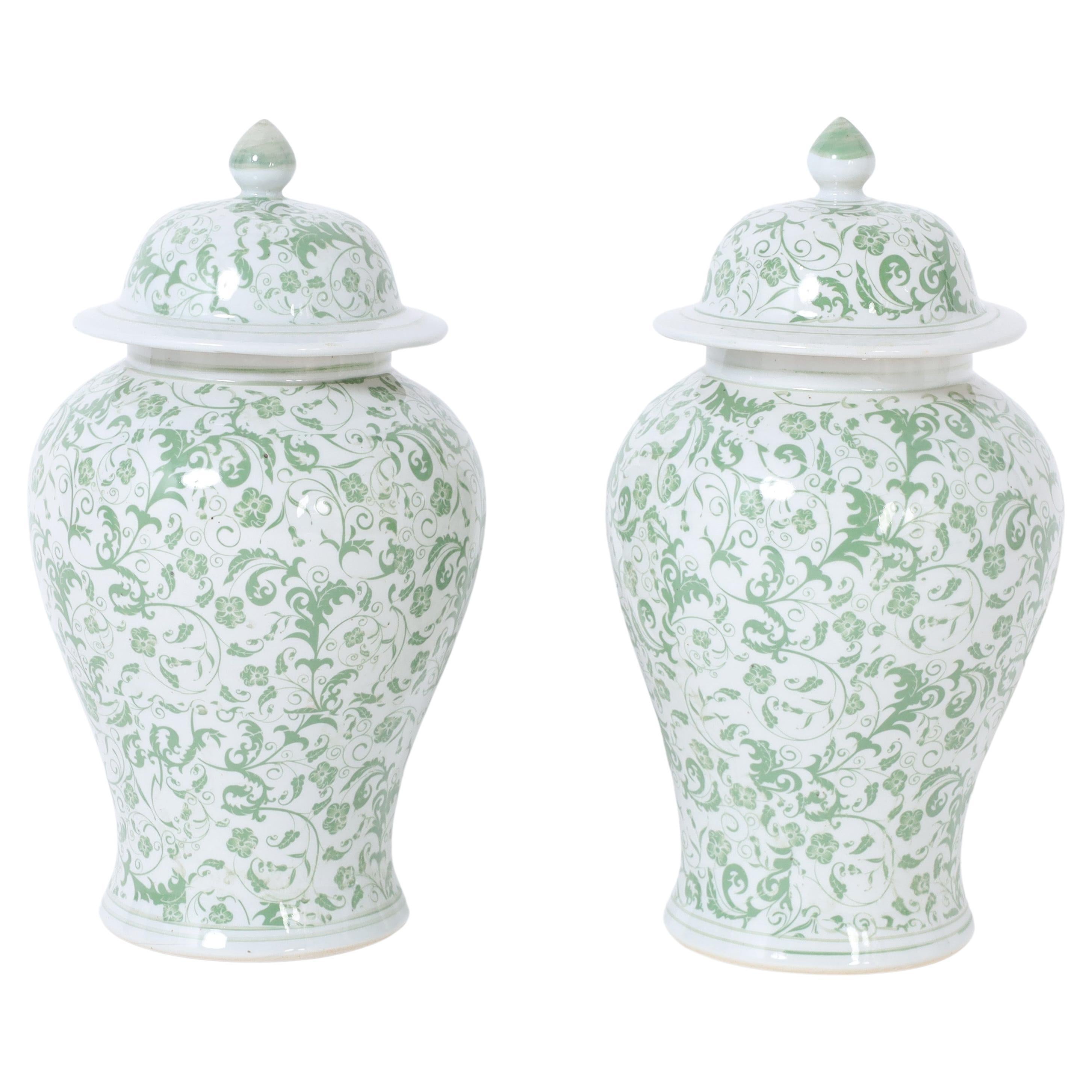 Pair of Chinese Green and White Porcelain Lidded Jars For Sale