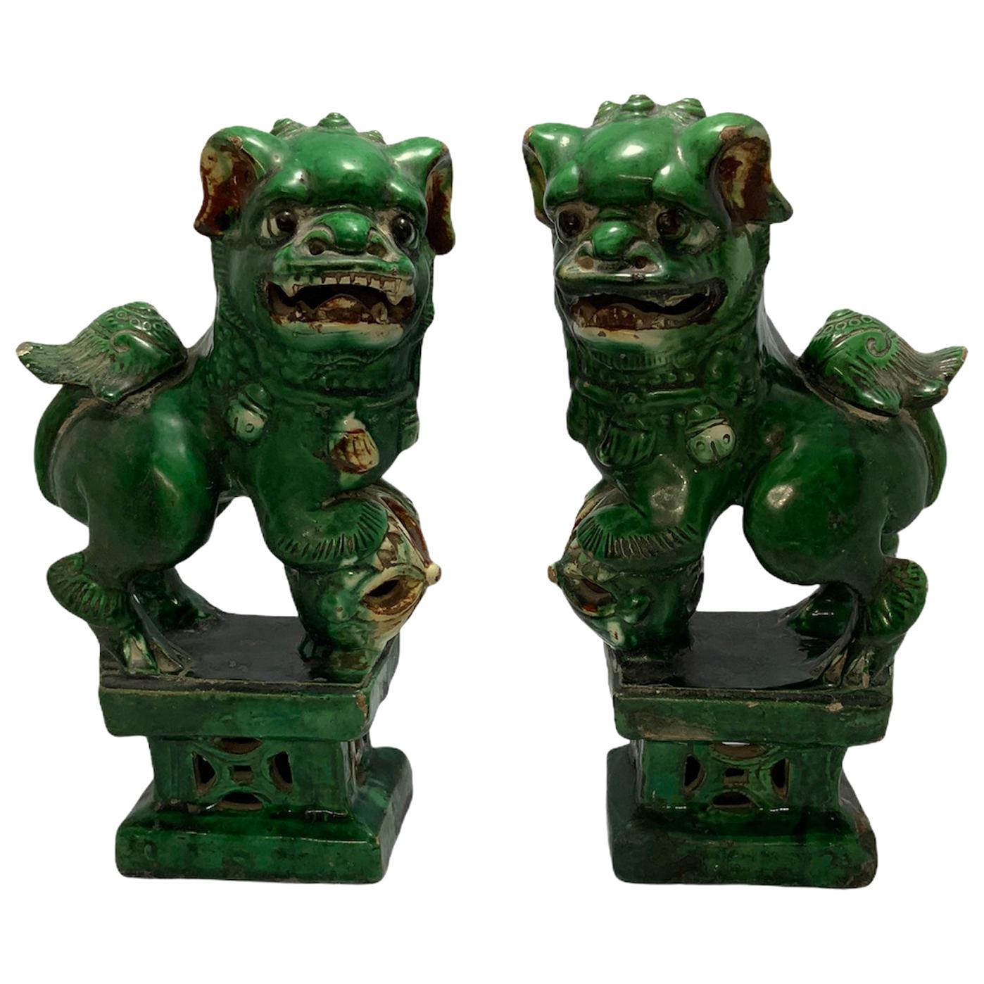 Pair of Chinese Green Ceramic Foo Dogs or Guardian Lions