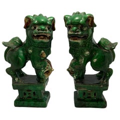 Pair of Chinese Green Ceramic Foo Dogs or Guardian Lions