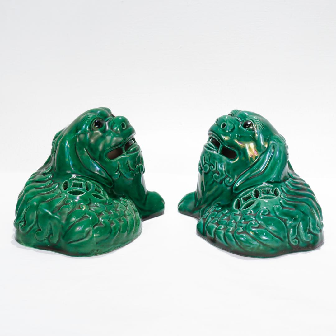 20th Century Pair of Chinese Green Glazed Pottery Recumbent Foo Dog Figurines For Sale