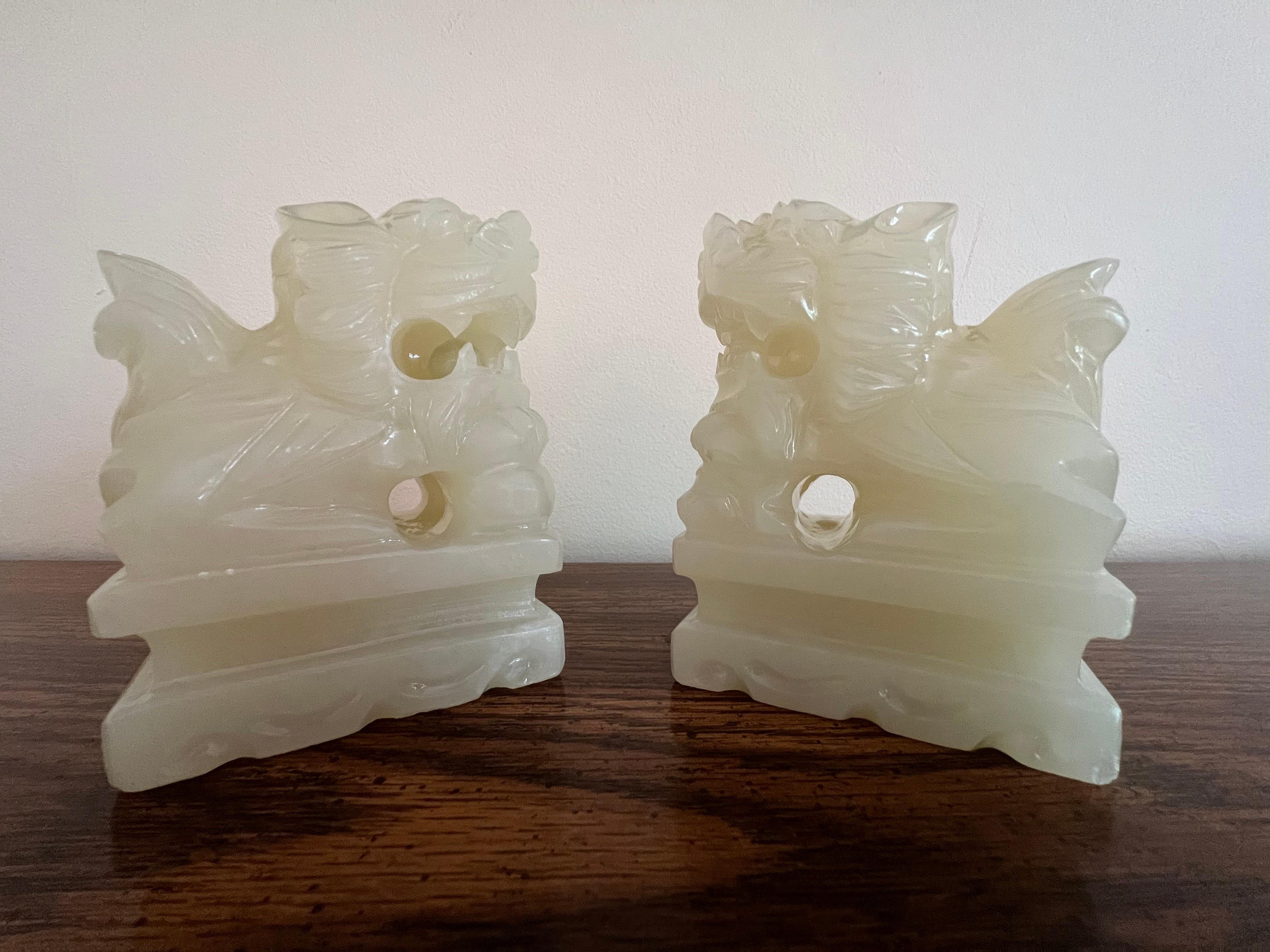 Hand-Carved Pair of Chinese Hand Carved White Jade Jadeite Foo Dog Sculpture, circa 1920