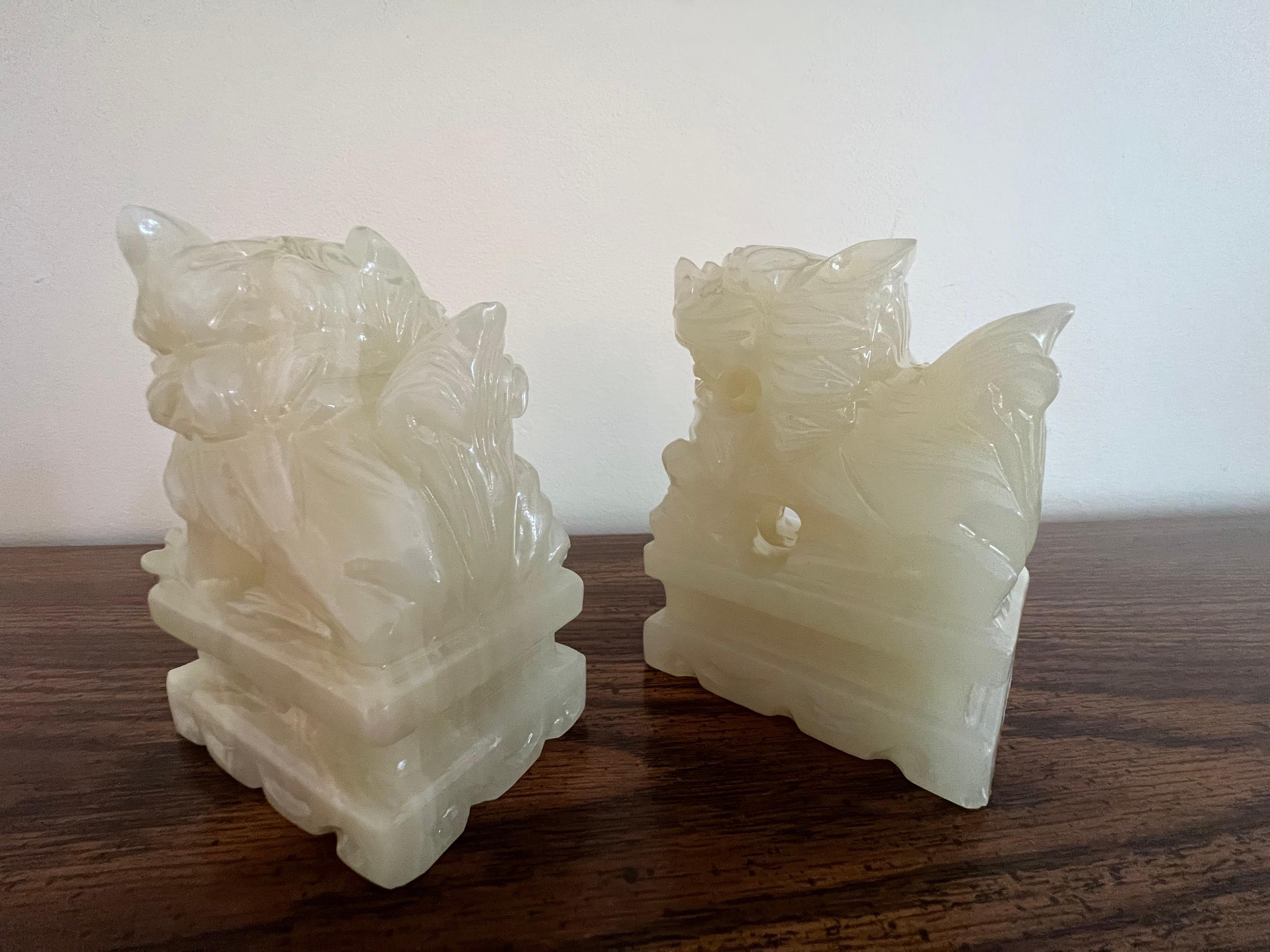 Early 20th Century Pair of Chinese Hand Carved White Jade Jadeite Foo Dog Sculpture, circa 1920